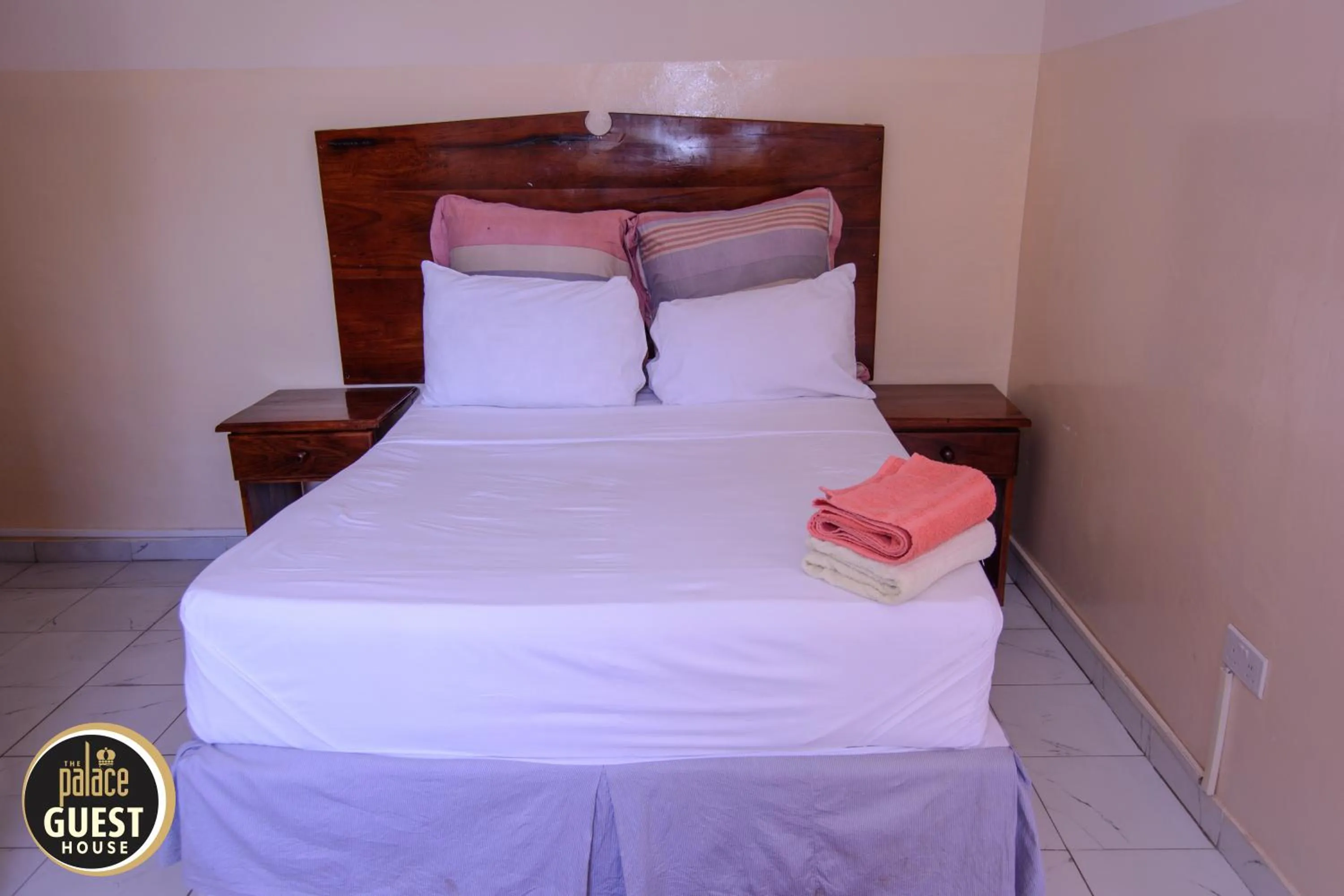 Bed in The Palace Guest House