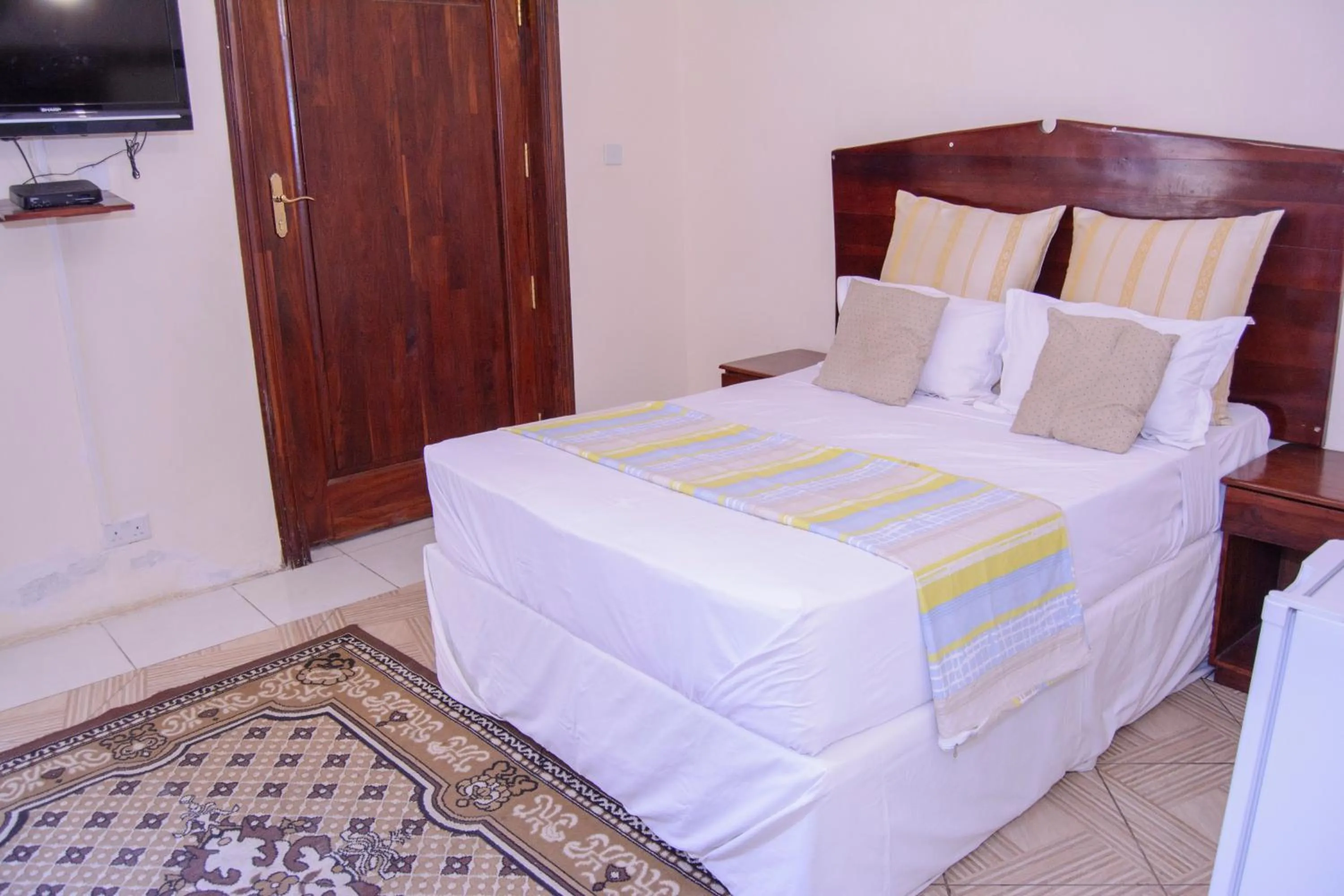 Bed in The Palace Guest House