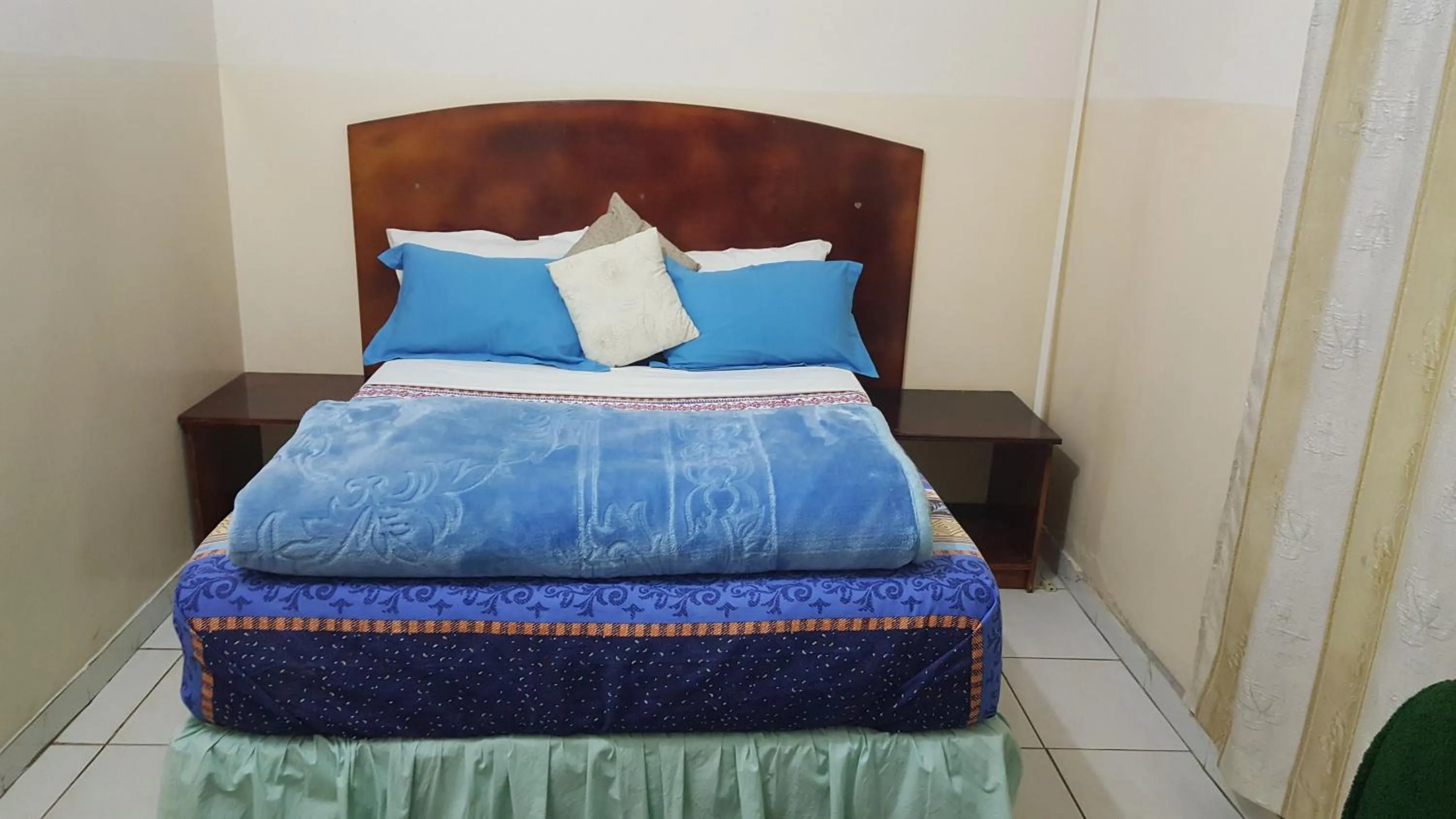 Bed in The Palace Guest House