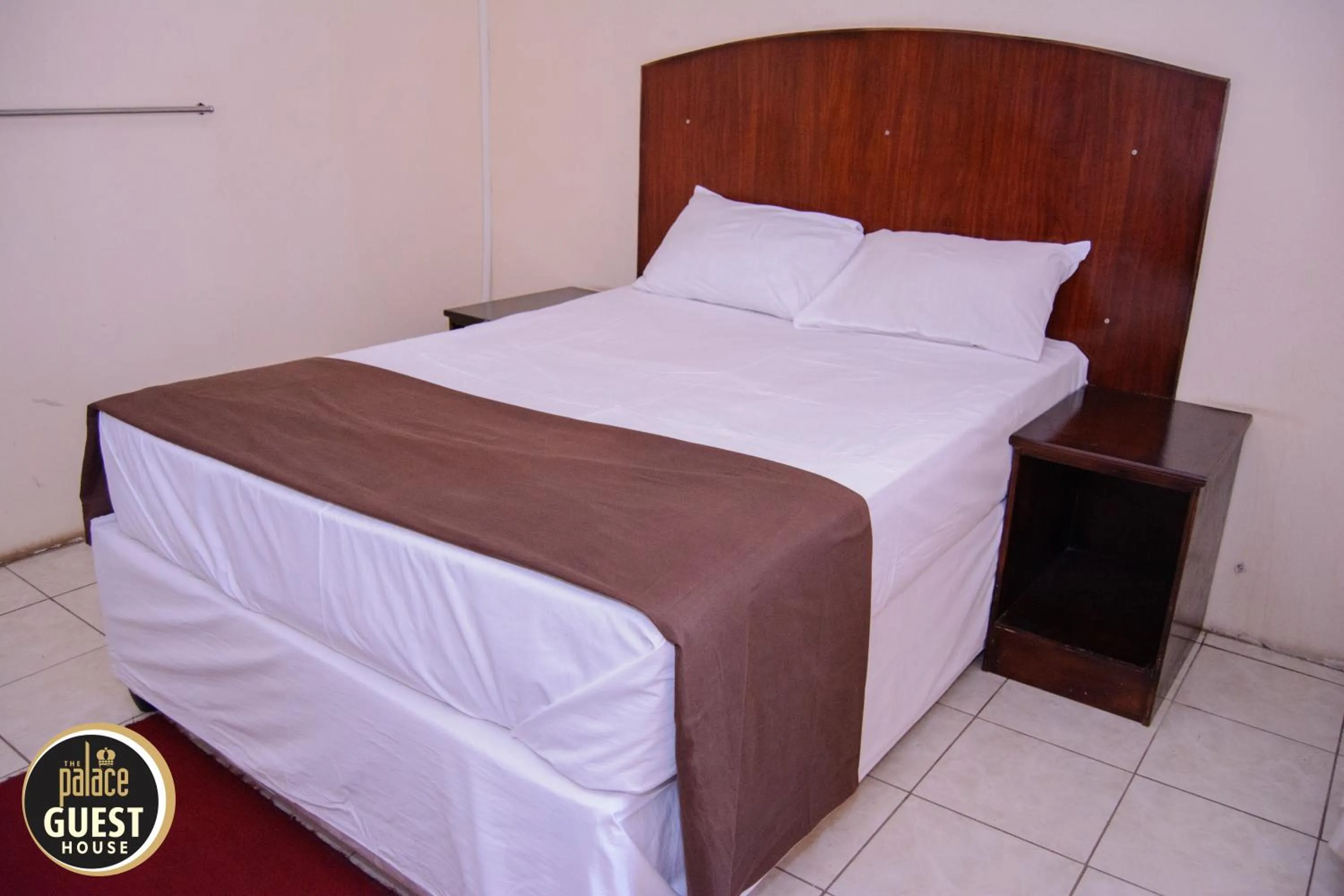 Bed in The Palace Guest House