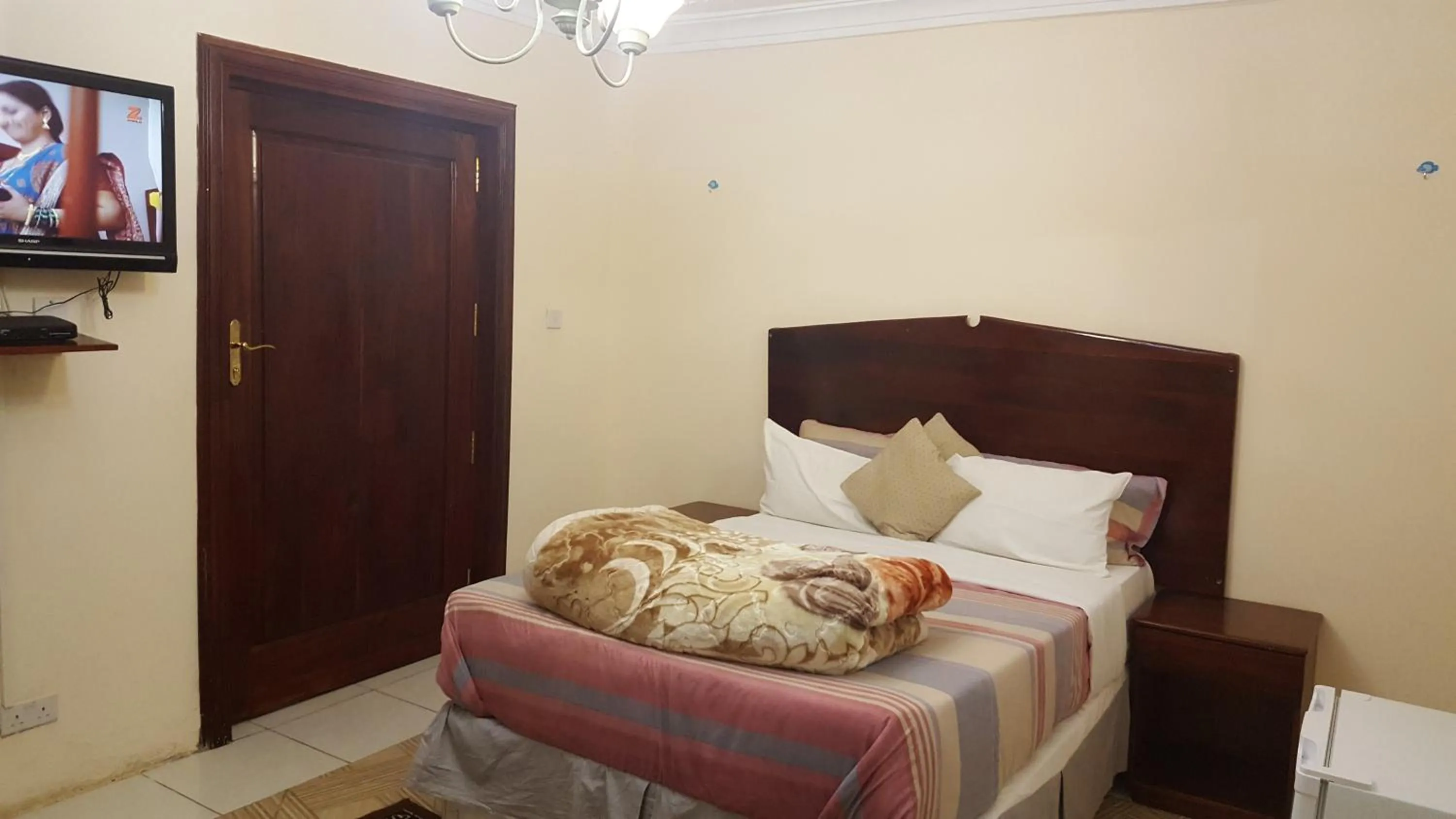 Bed in The Palace Guest House