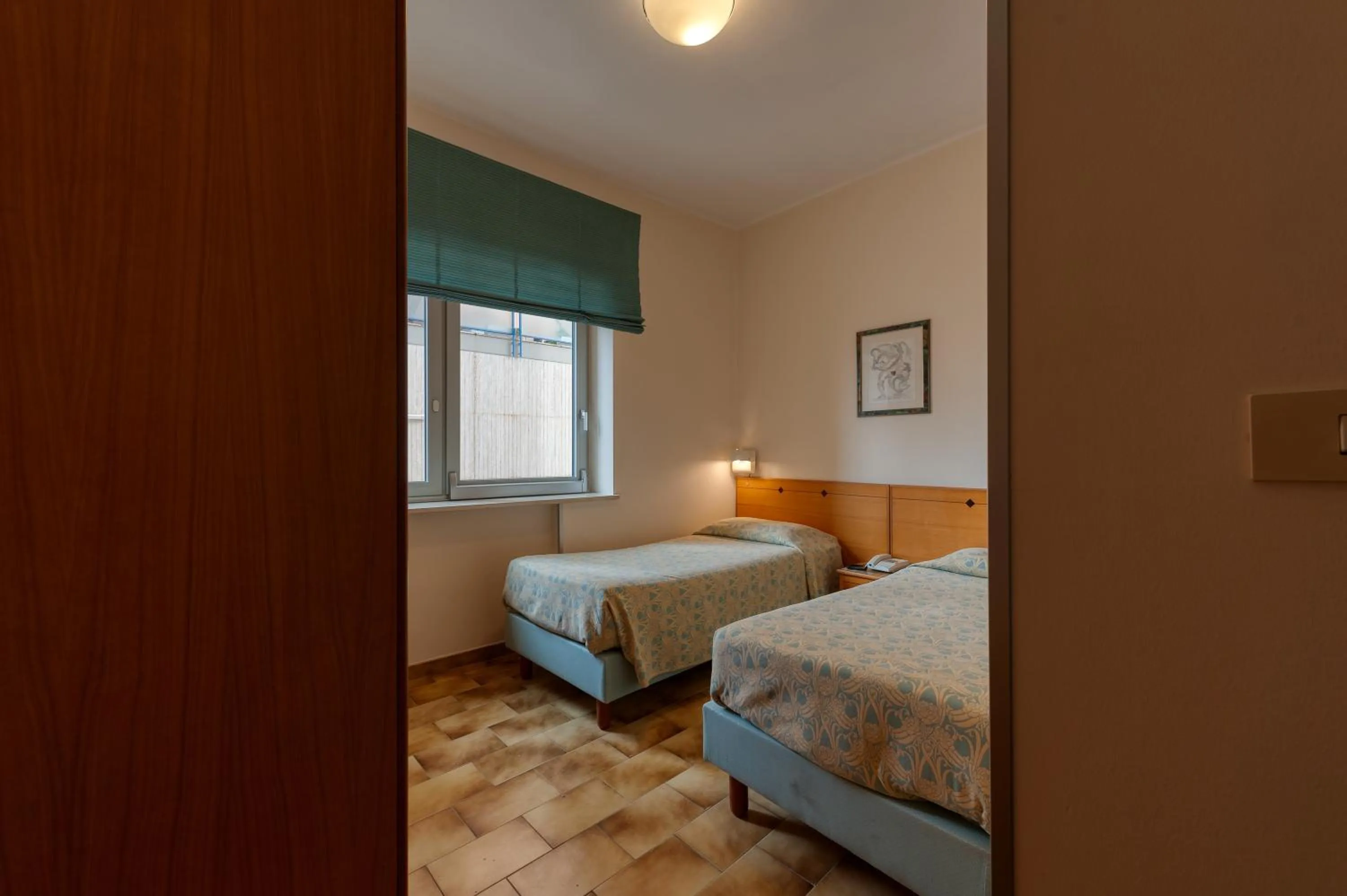 Bed in Hotel Barsotti