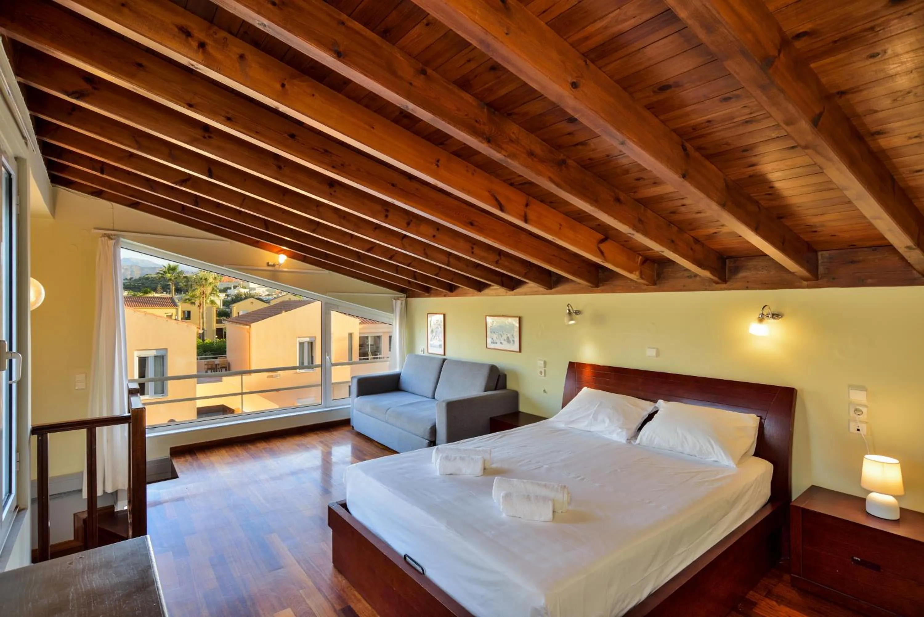 Bed in Elma's Dream Apartments & Villas