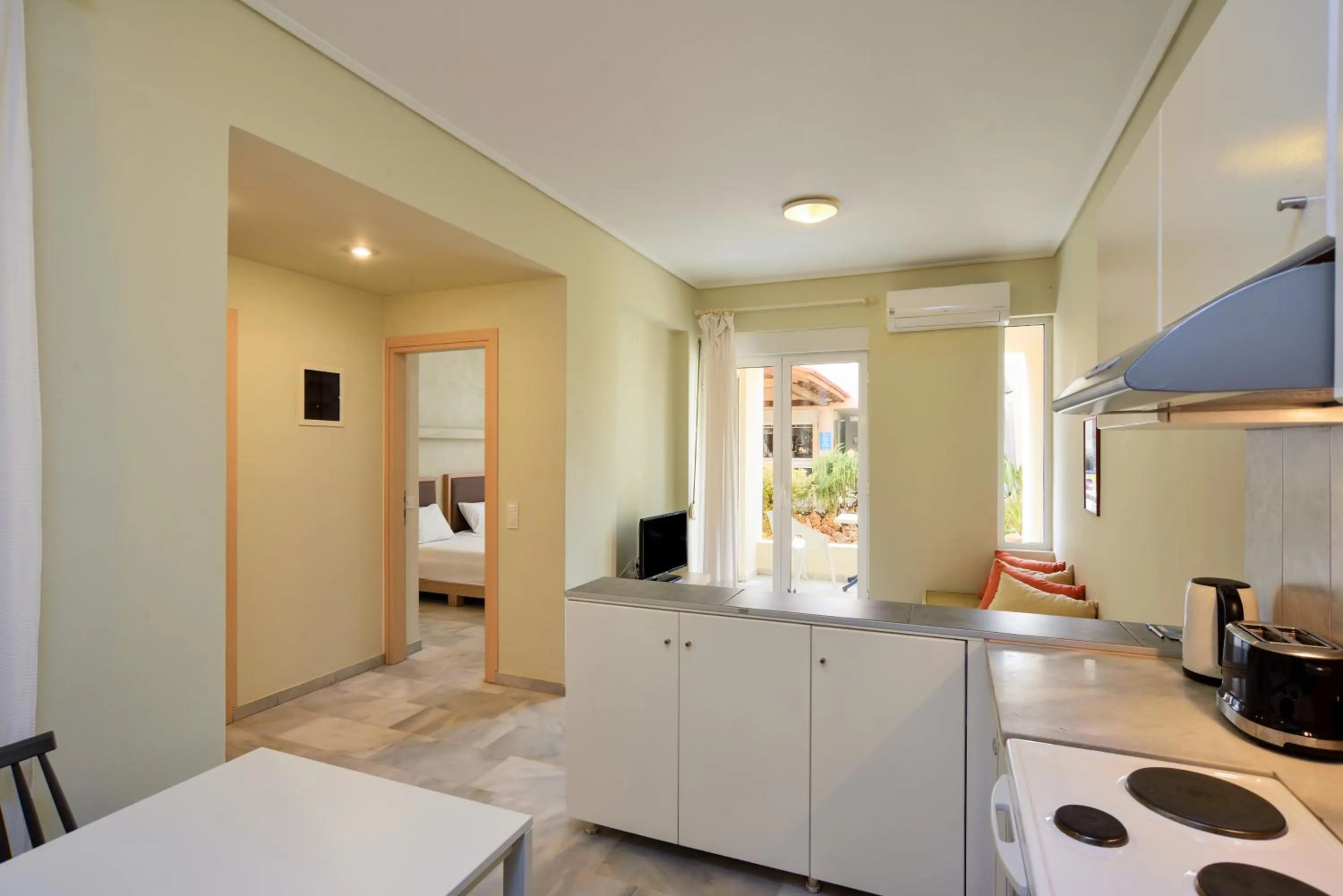 Kitchen or kitchenette, Bed in Elma's Dream Apartments & Villas