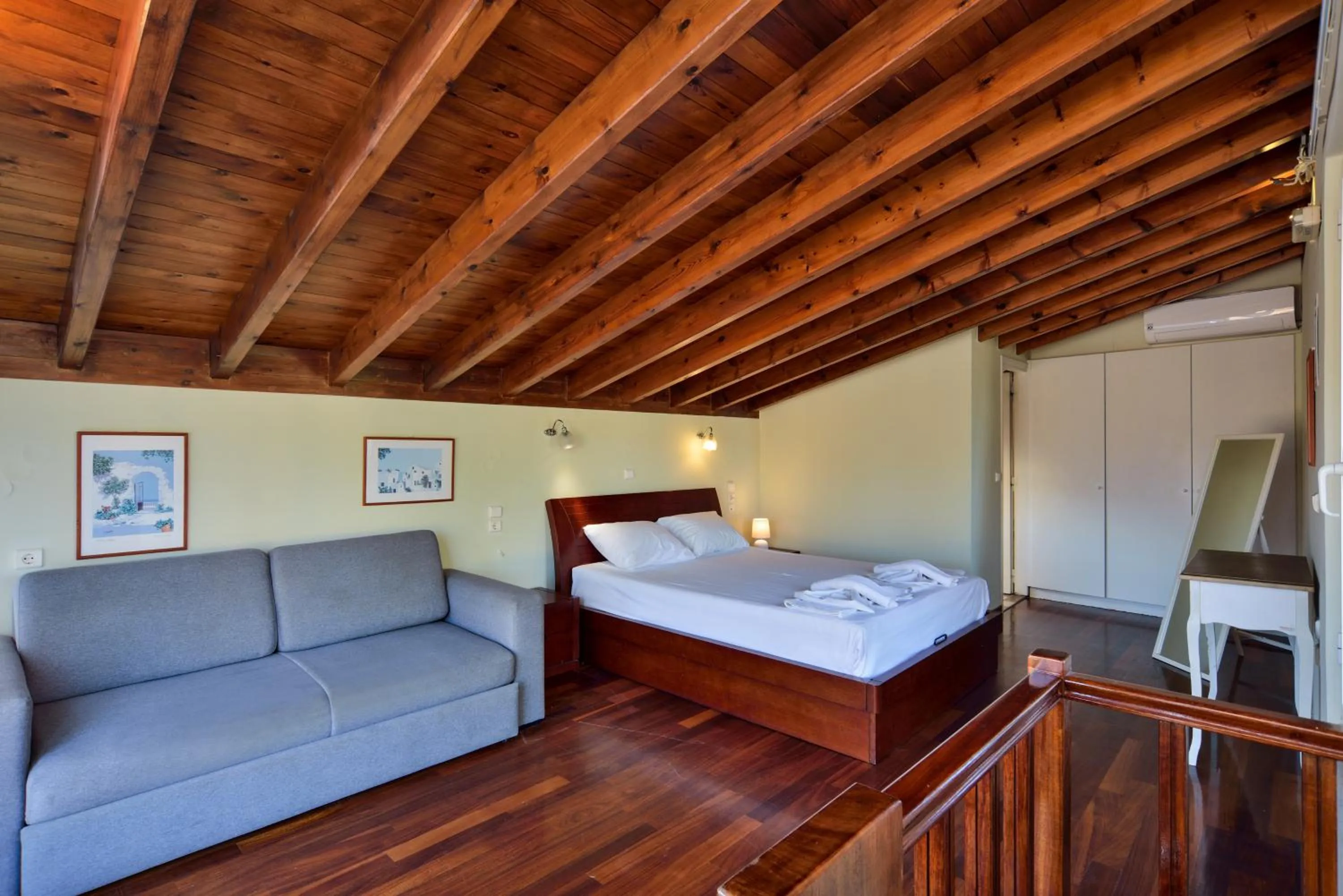 Bed in Elma's Dream Apartments & Villas