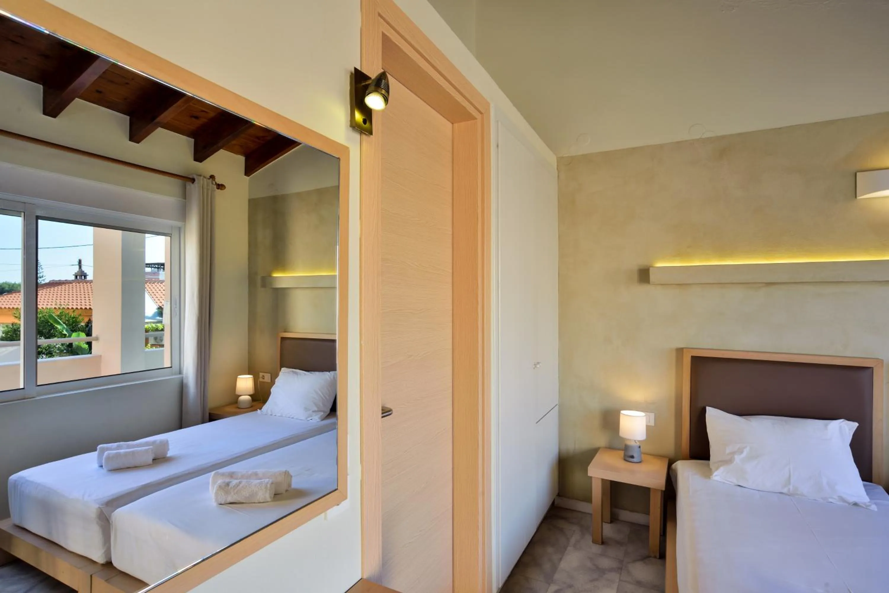 Bed in Elma's Dream Apartments & Villas