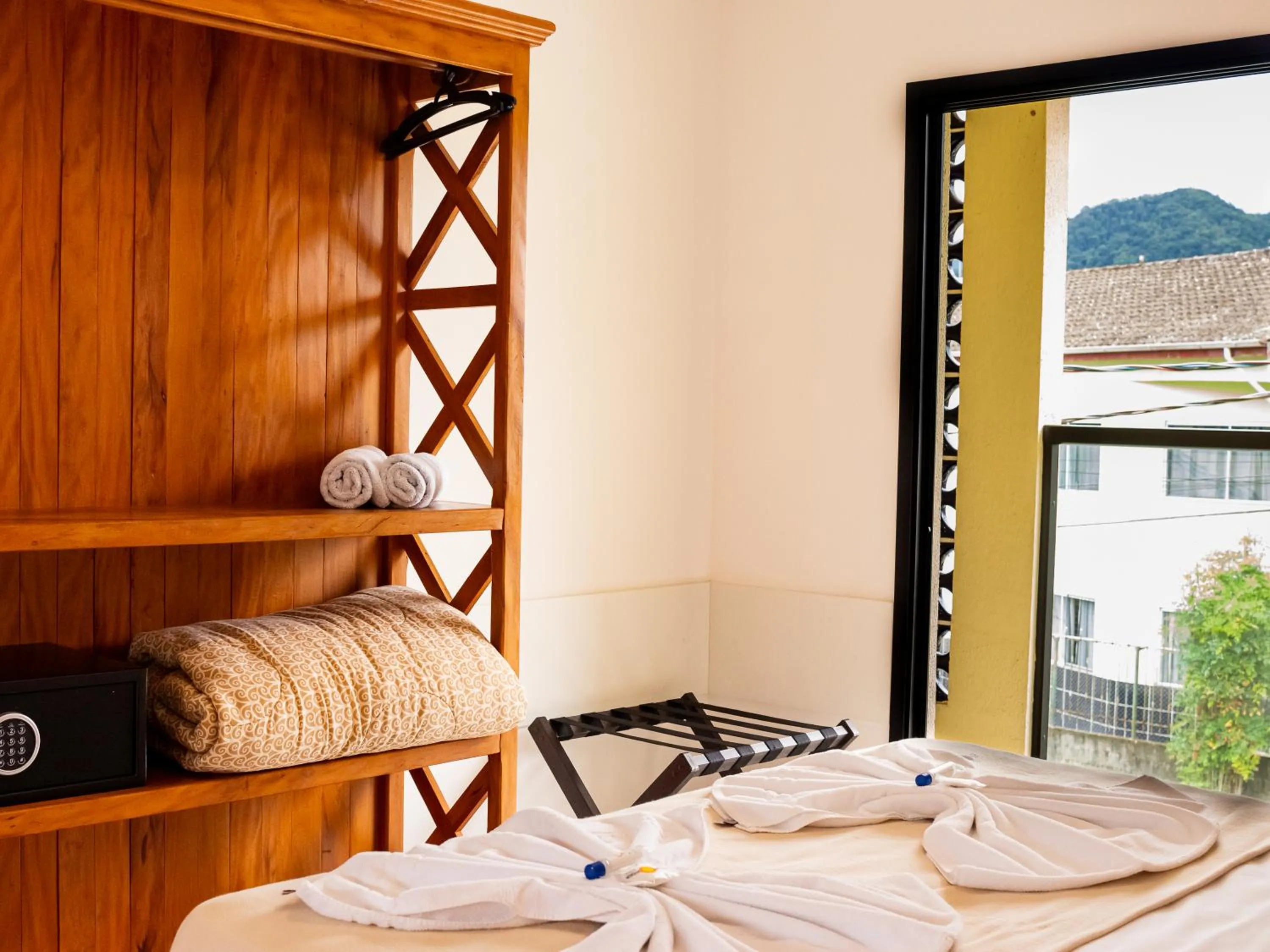 Bed in Pousada Ilha Vitoria