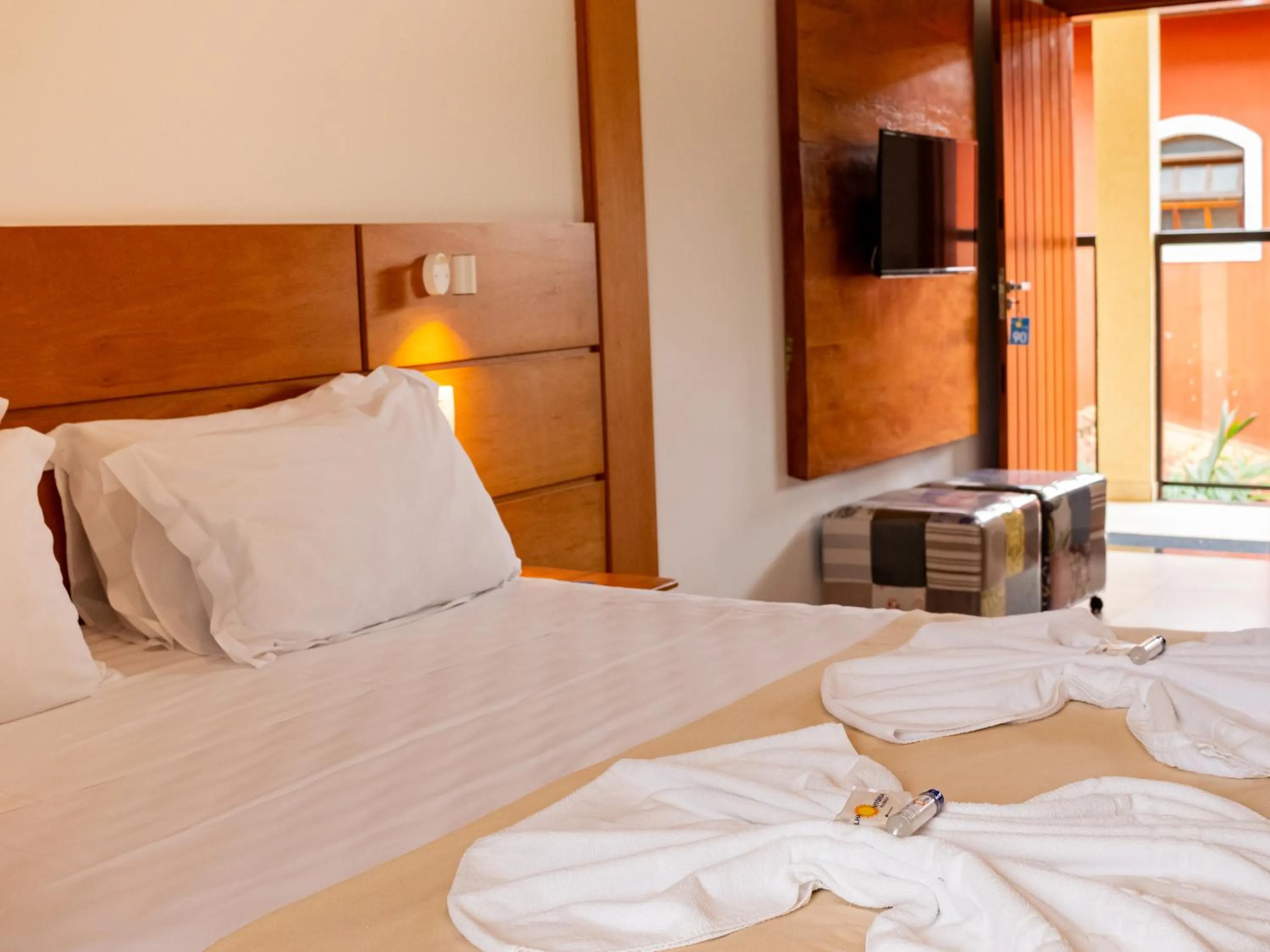 Bed in Pousada Ilha Vitoria