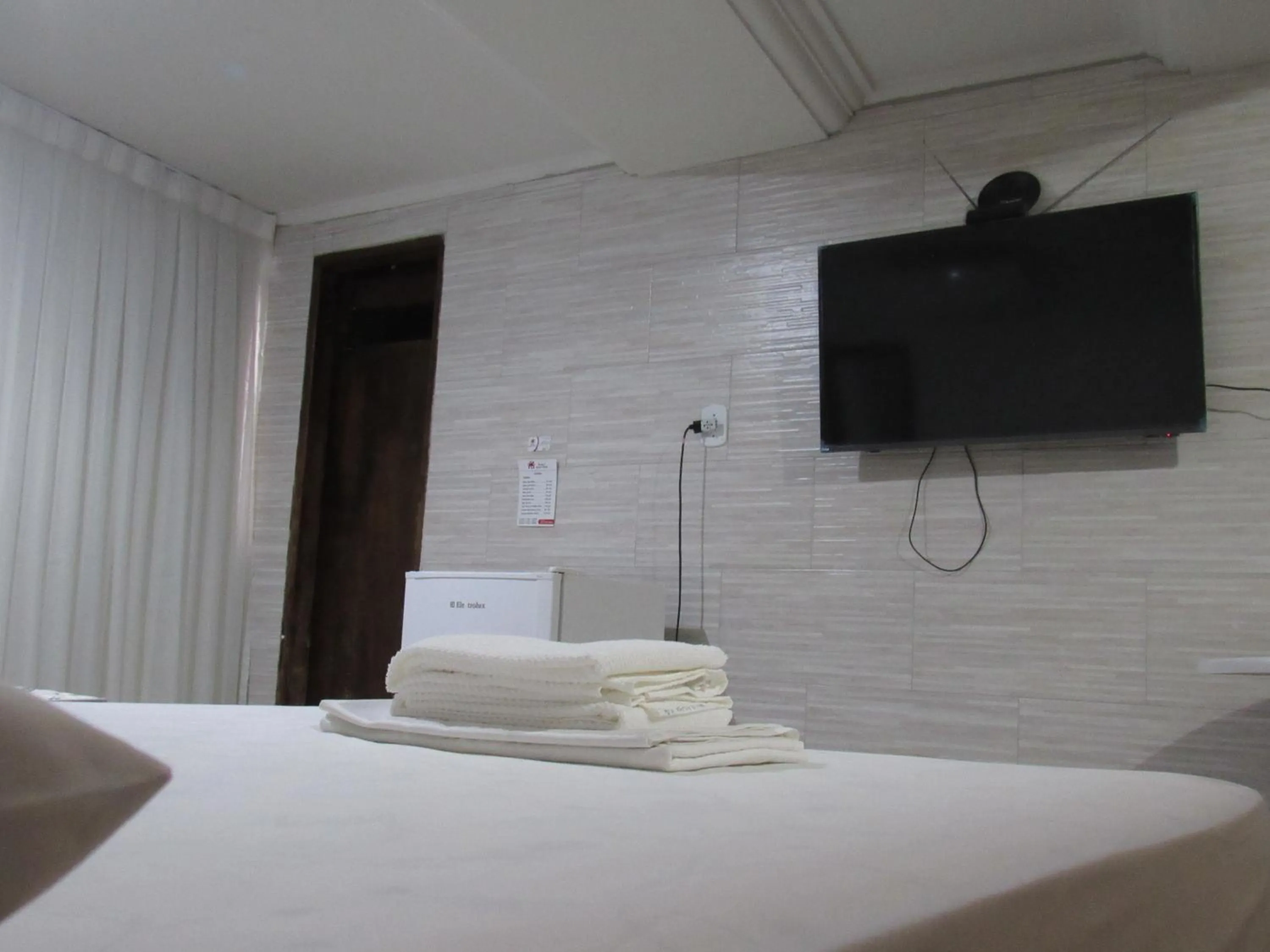 Bed in River Class Hotel