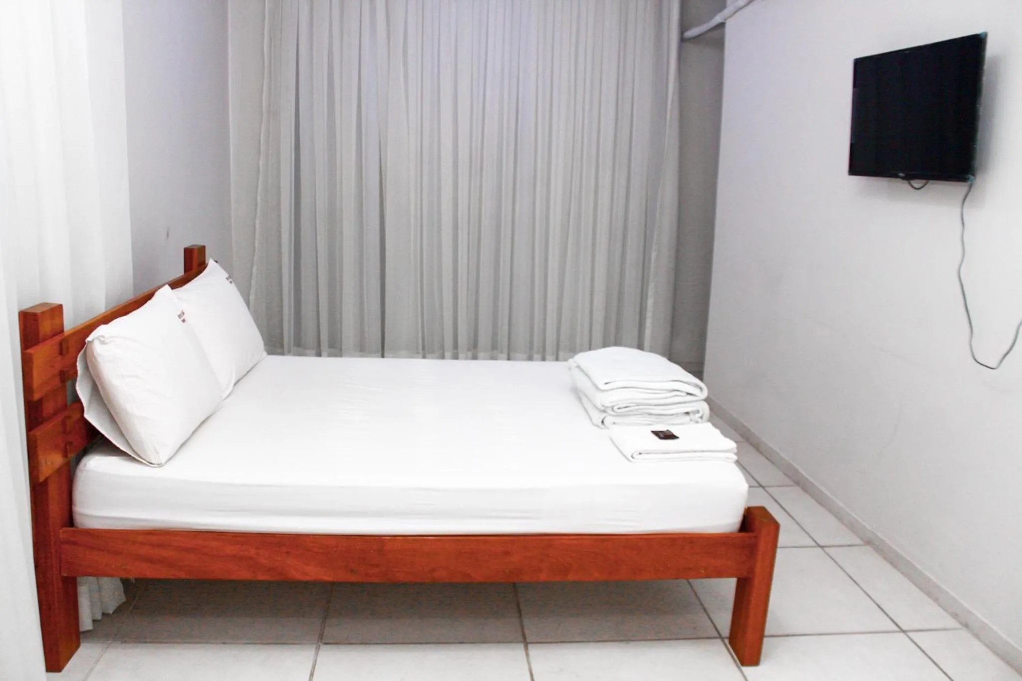 Bed in River Class Hotel