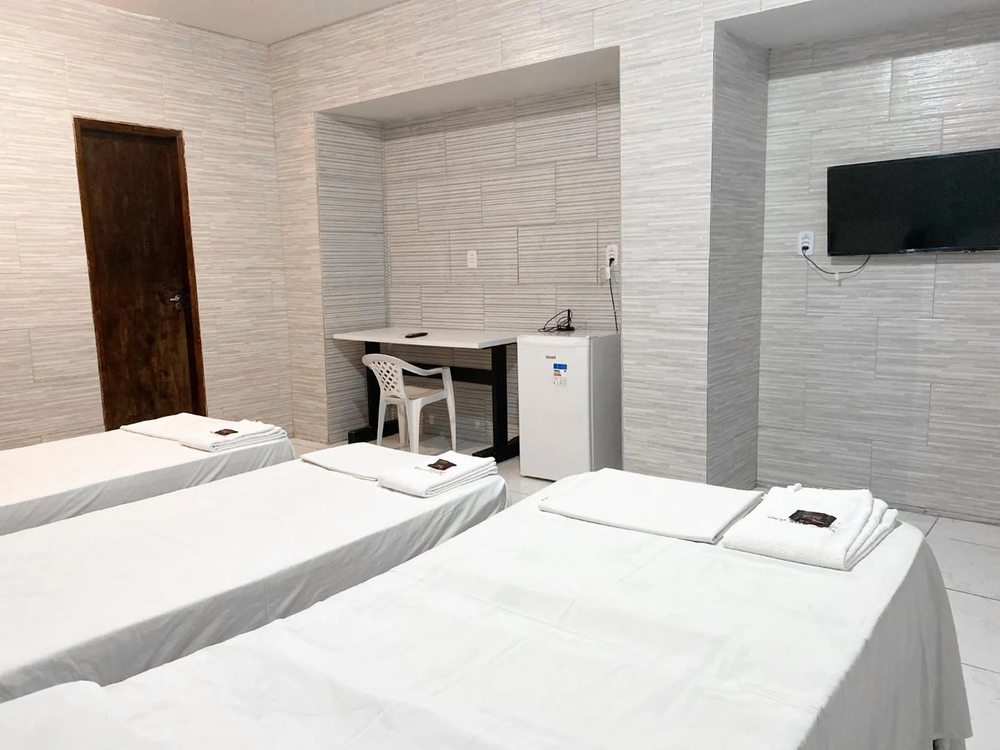 Bed in River Class Hotel