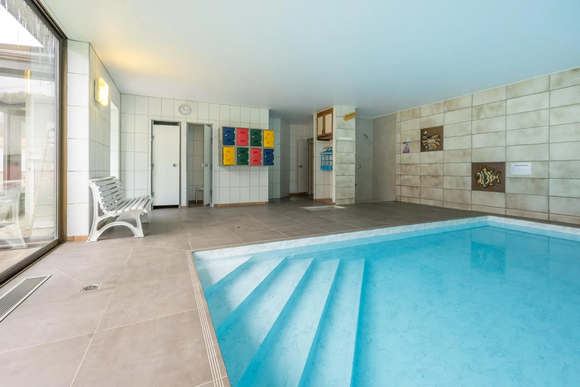 Pool view in Logis Hostellerie Motel Au Bois Le Sire