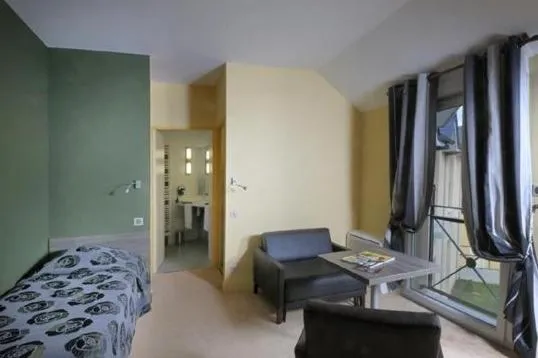 Bedroom, Bed in Logis Hôtel de la Tour