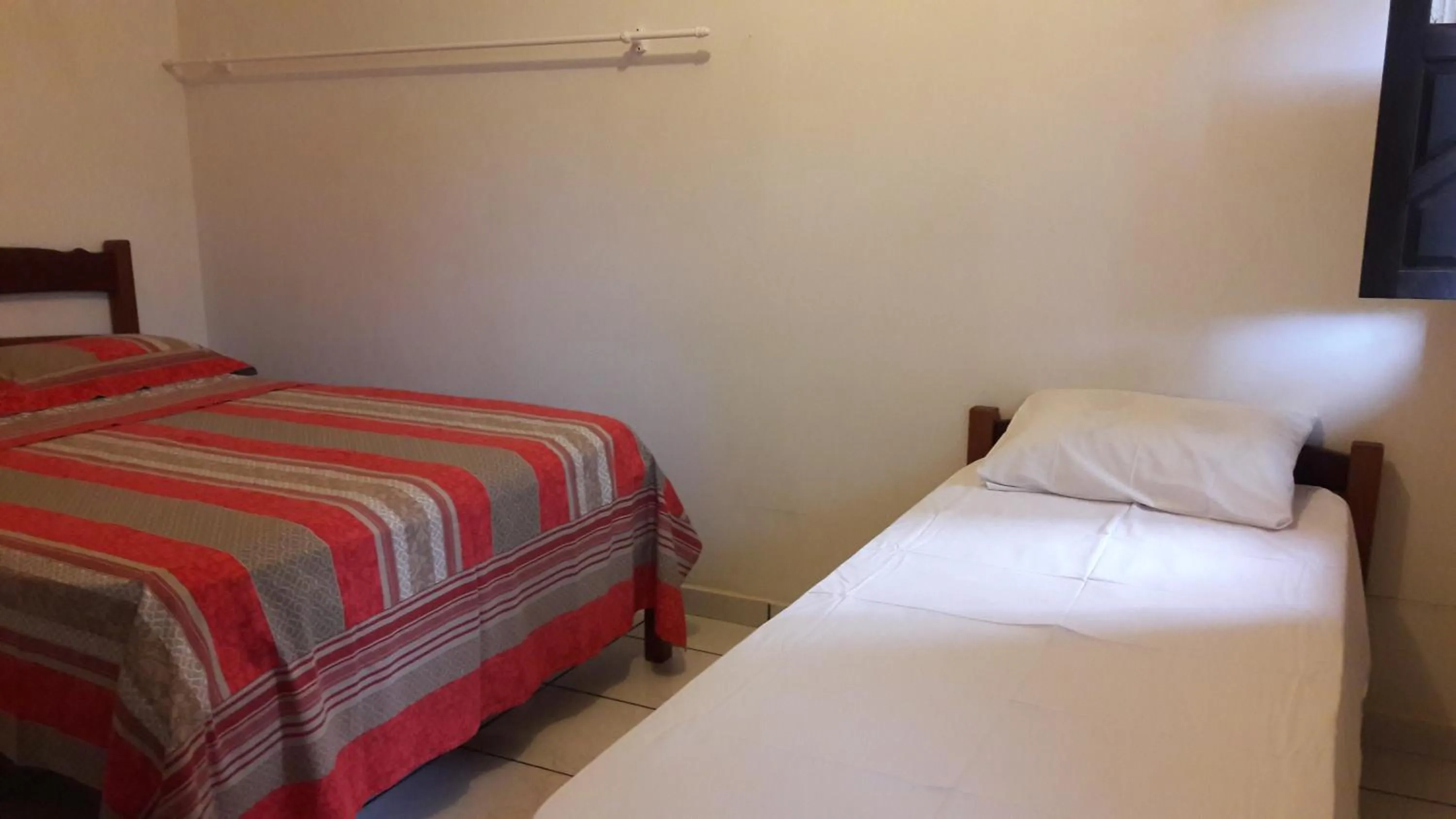 Photo of the whole room, Bed in Pousada Rio e Mar