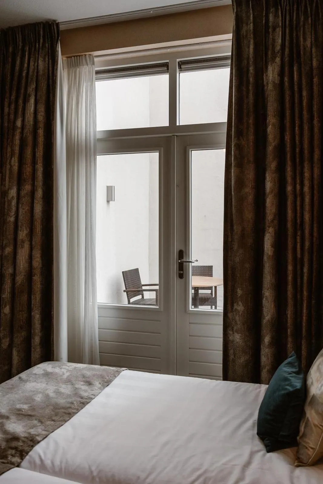 Bed in Hotel Amerika