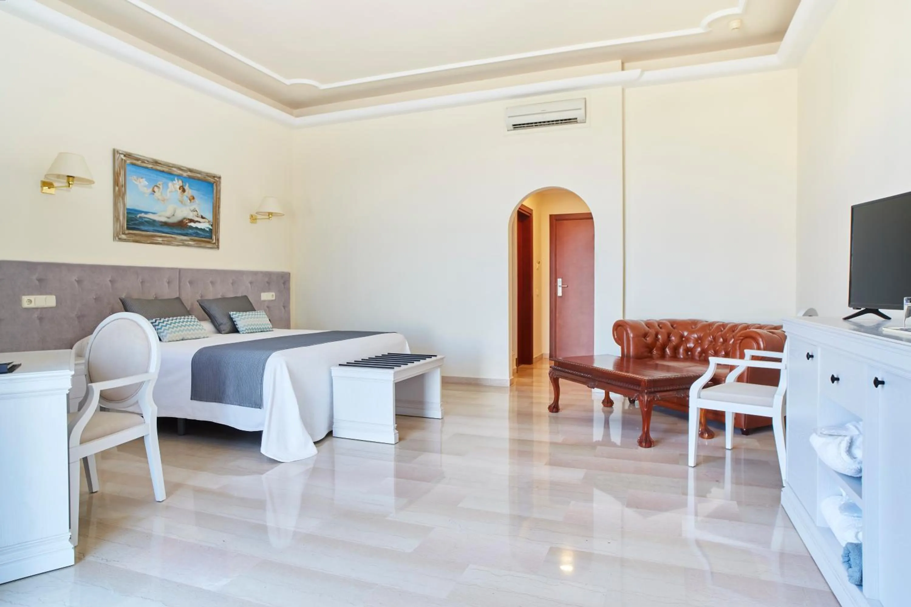 Seating area, Bed in Grand Hotel Palladium Santa Eulalia del Río