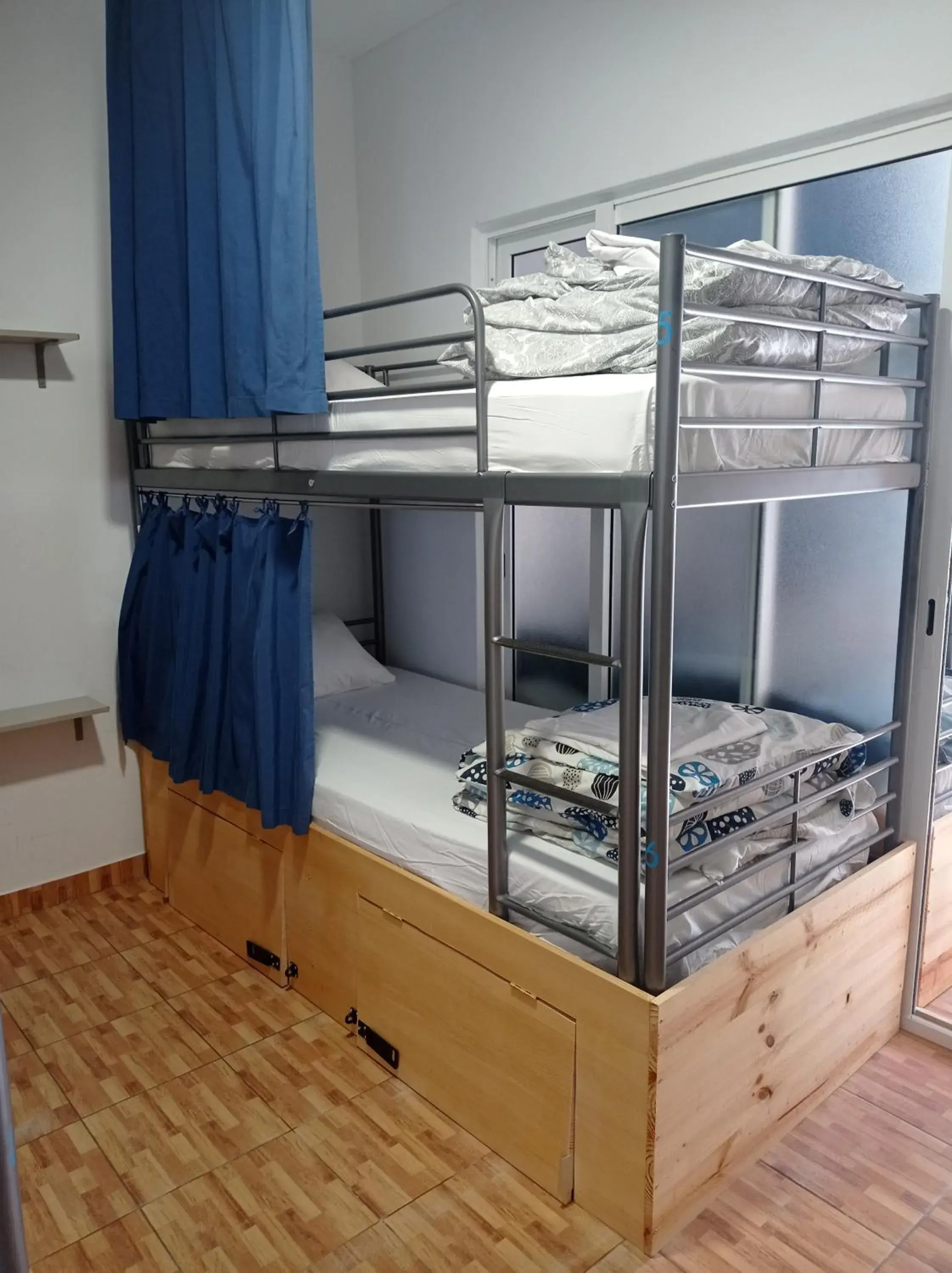 Bed in 8-Bed Mixed Dormitory Room in Orange3 Hostel Bed in 8-Bed Mixed Dormitory Room in Orange3 Hostel