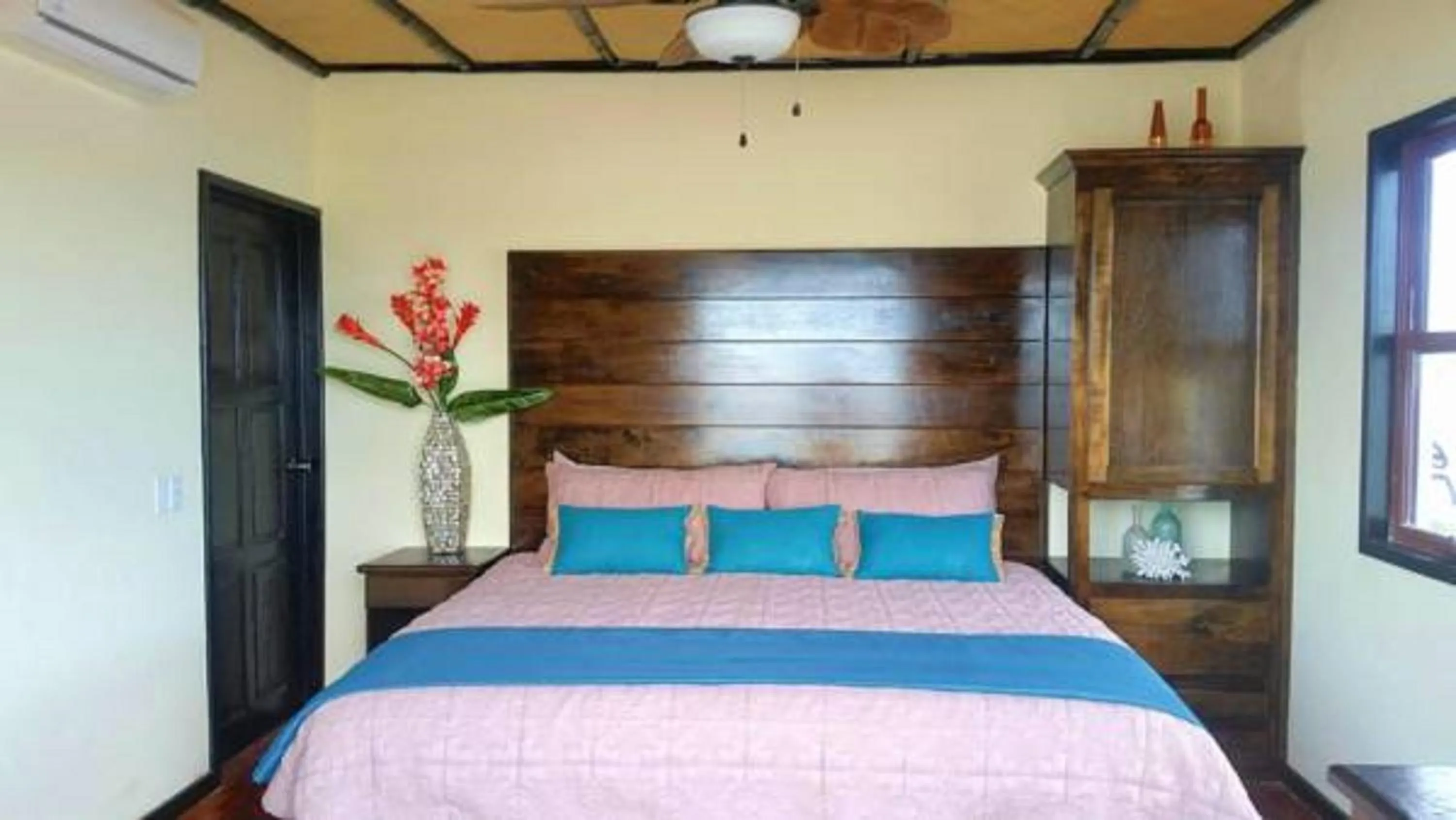 Bed in Lina Point Belize Overwater Resort