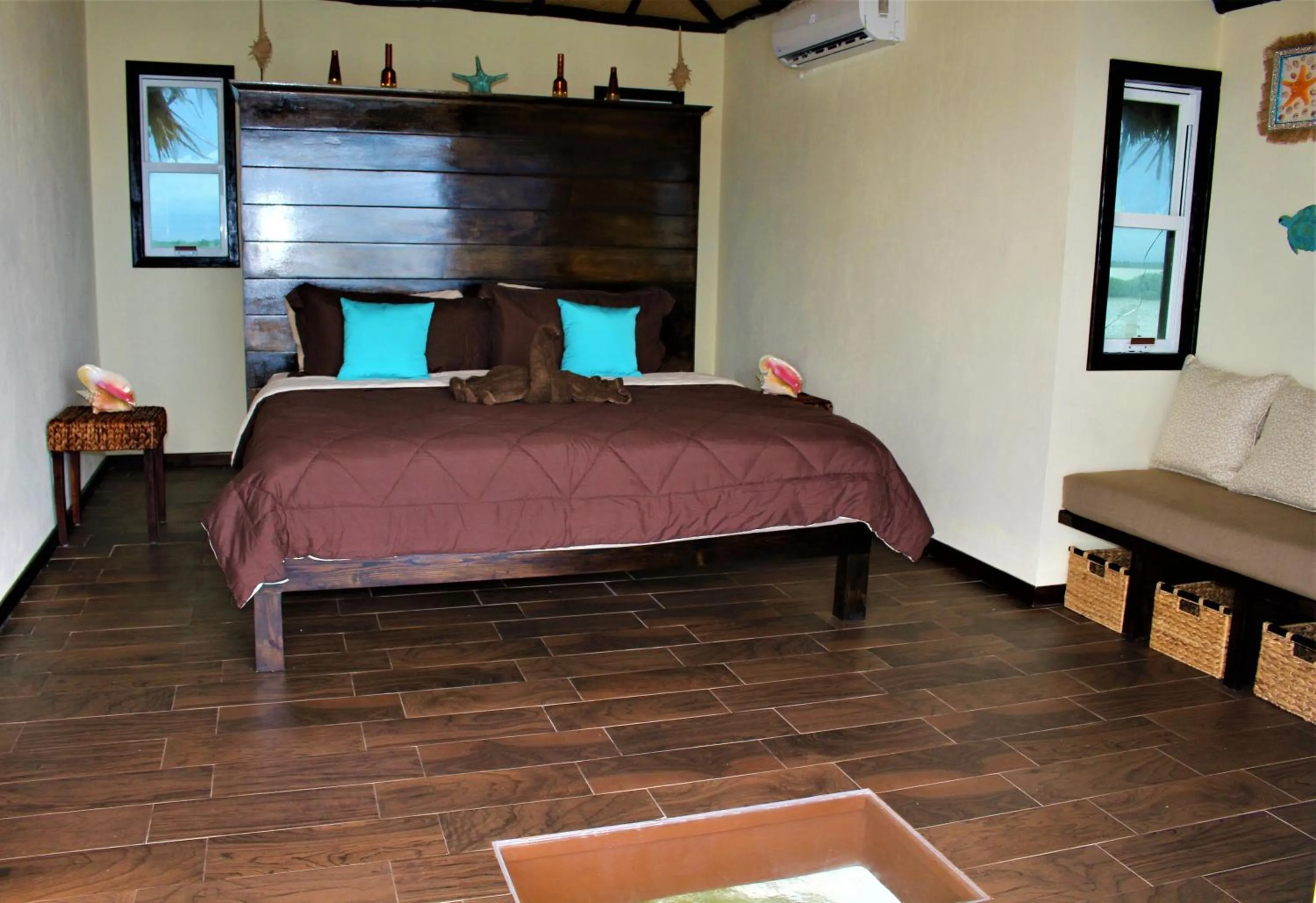 Bed in Lina Point Belize Overwater Resort