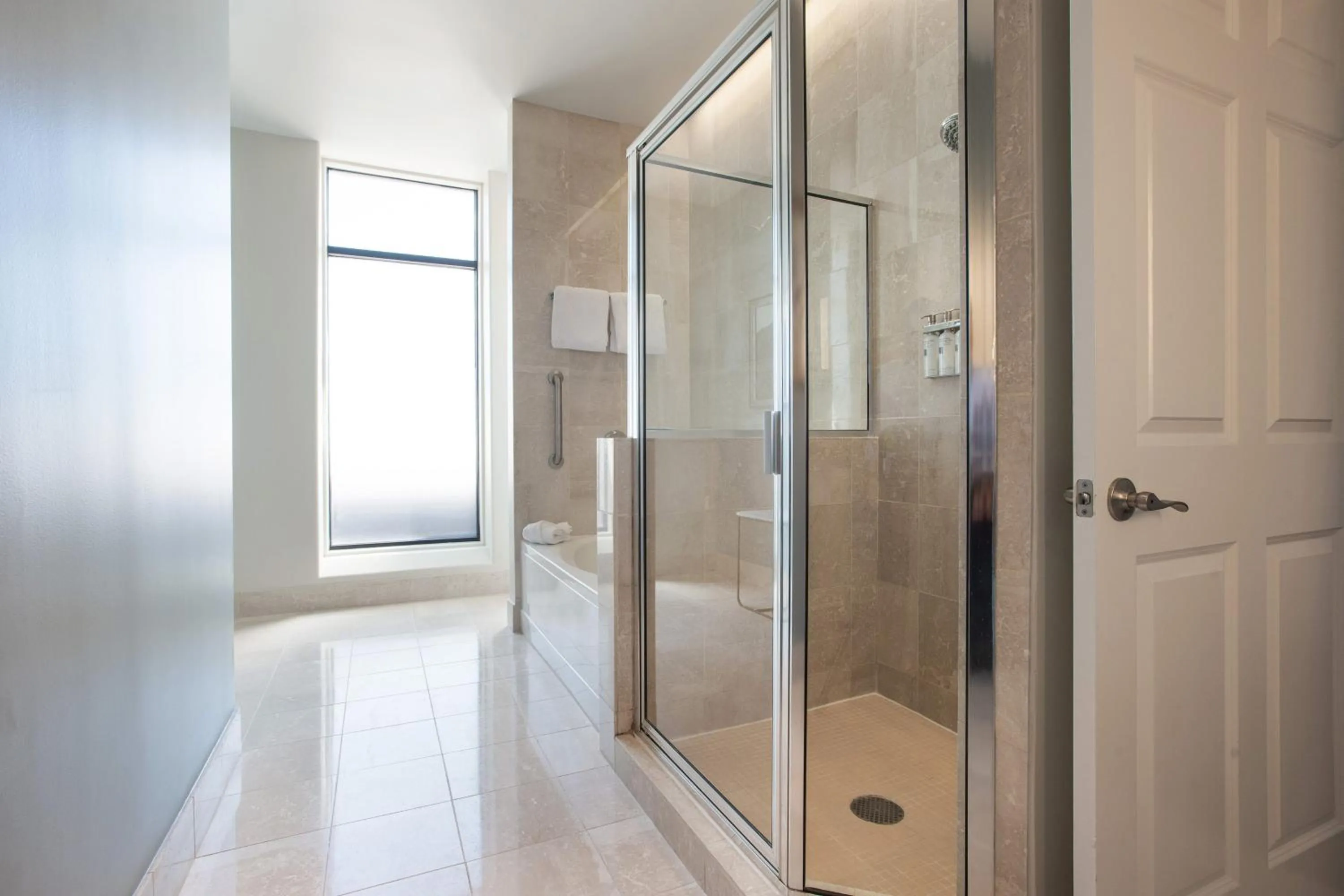 Bathroom in Magnolia Hotel Houston, a Tribute Portfolio Hotel