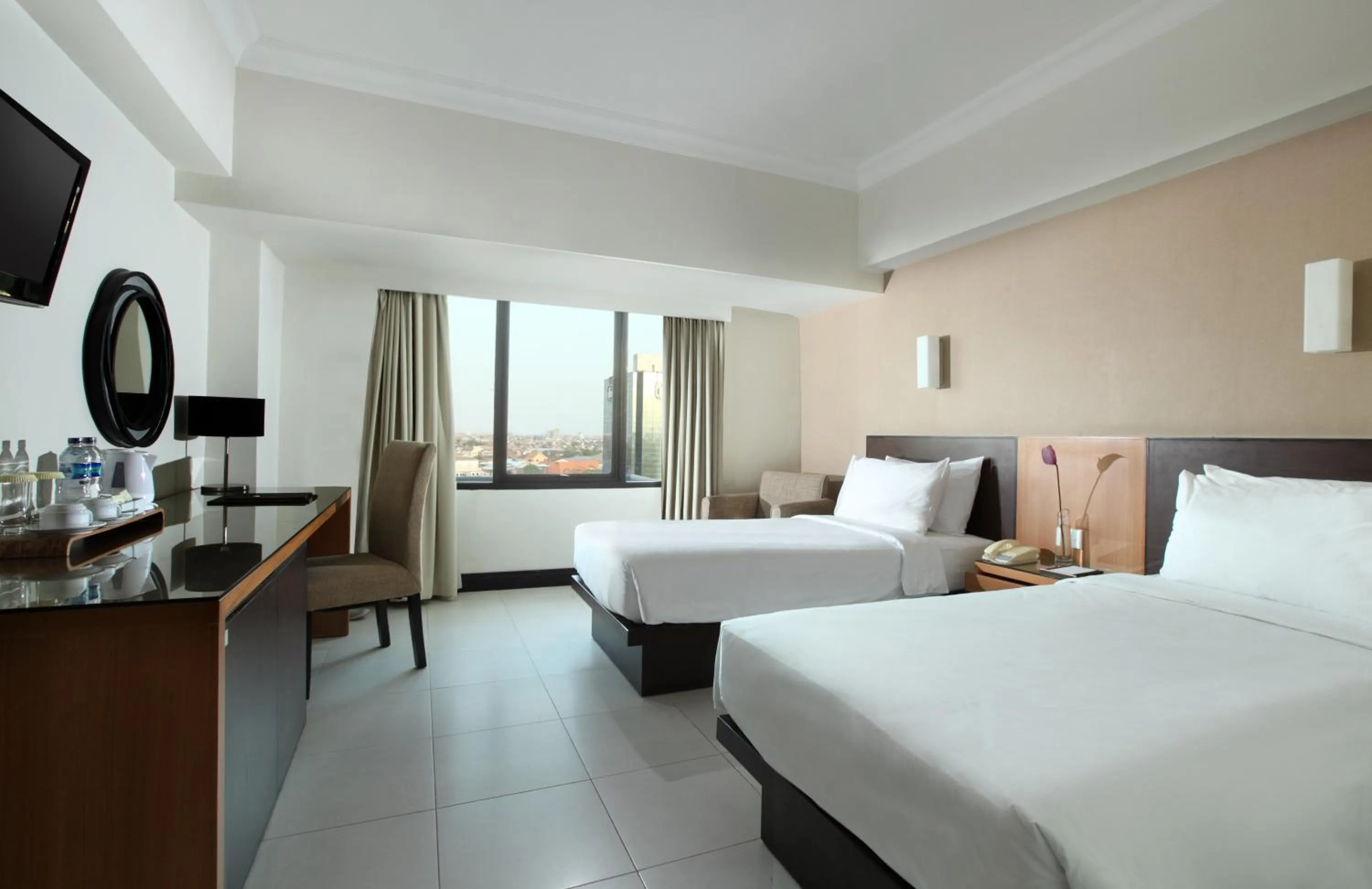 Photo of the whole room, Bed in Hotel Santika Pandegiling - Surabaya