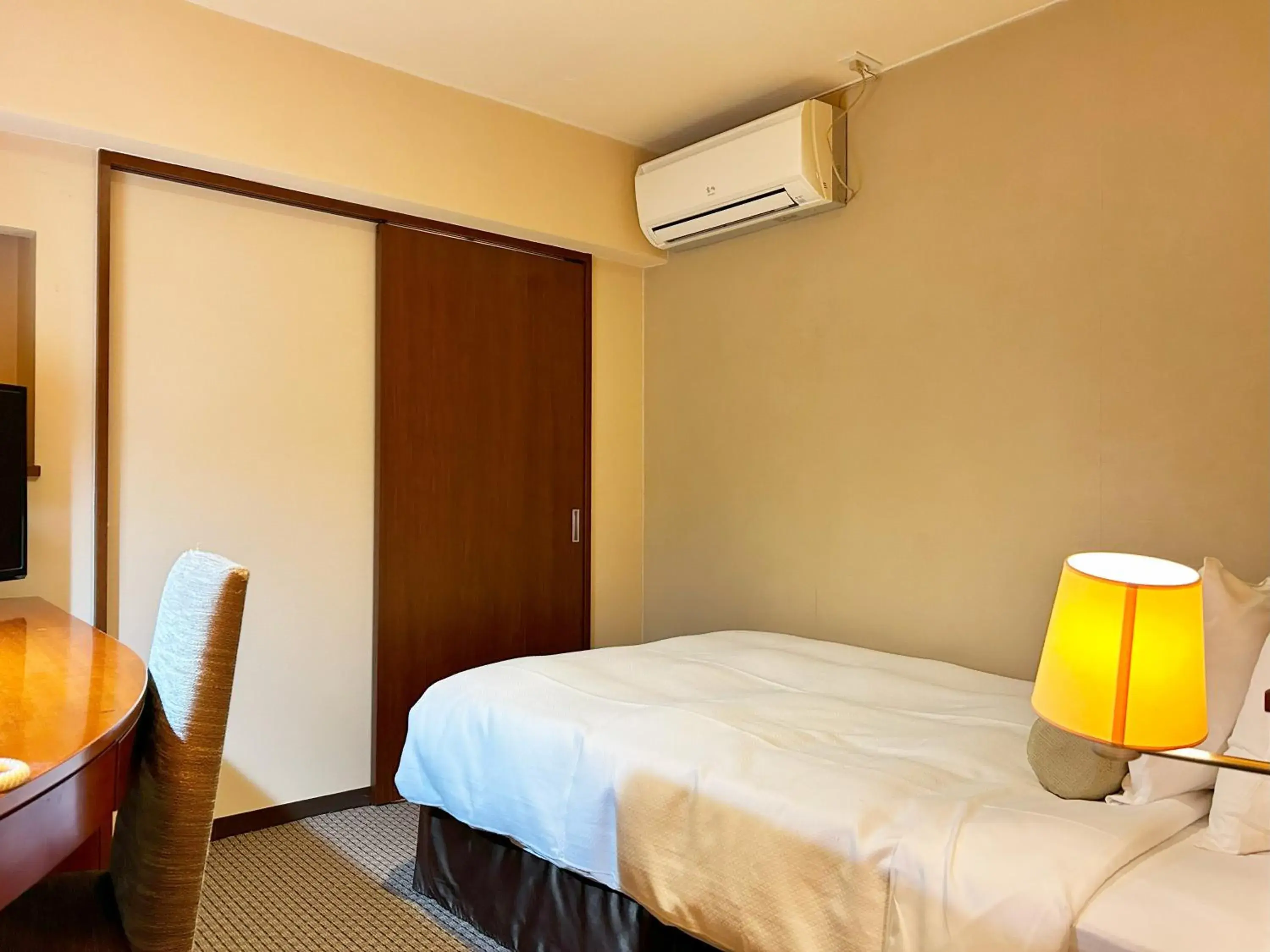 Bed in Nakajimaya Grand Hotel Bed in Nakajimaya Grand Hotel