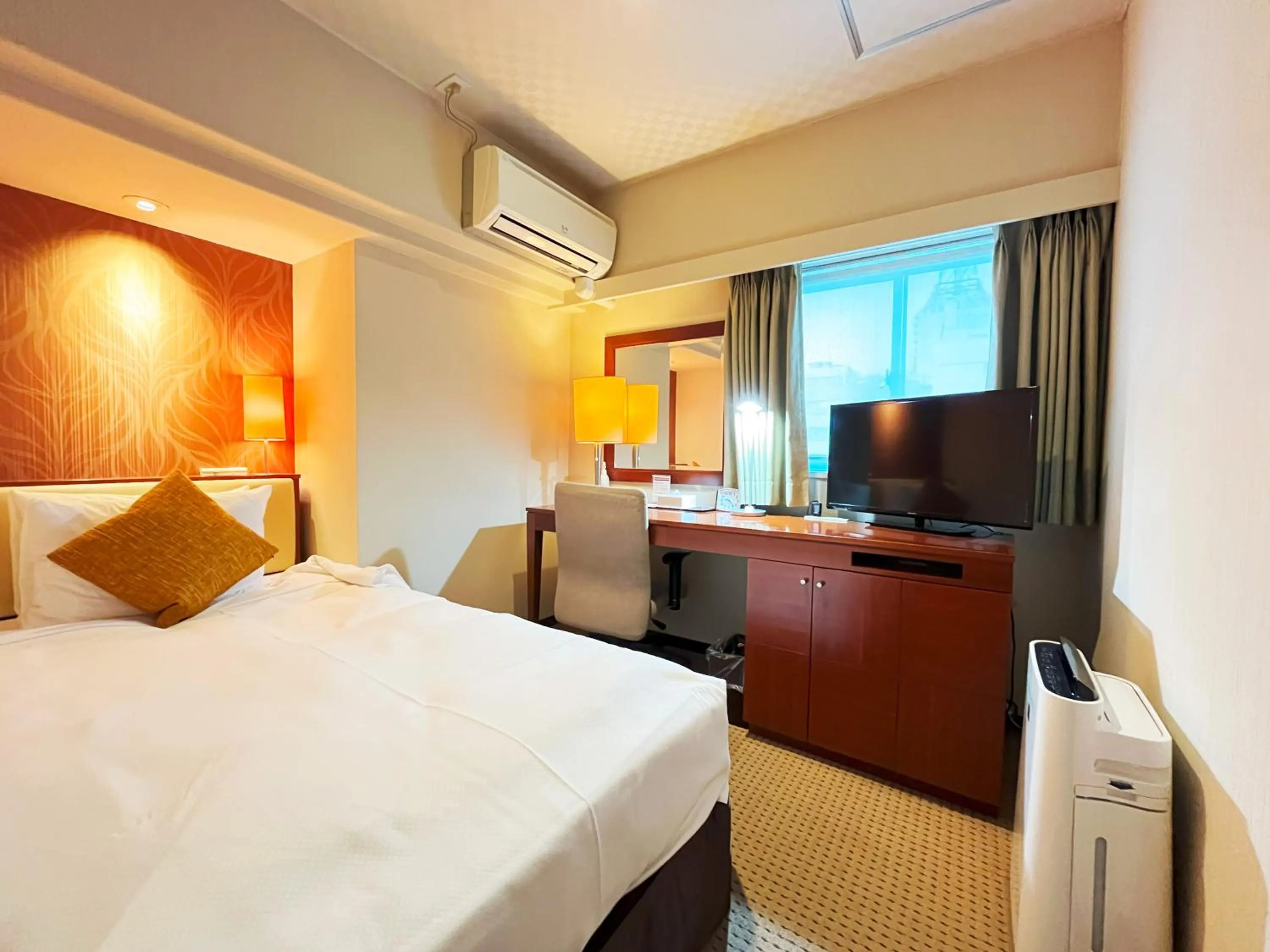 Bed in Nakajimaya Grand Hotel