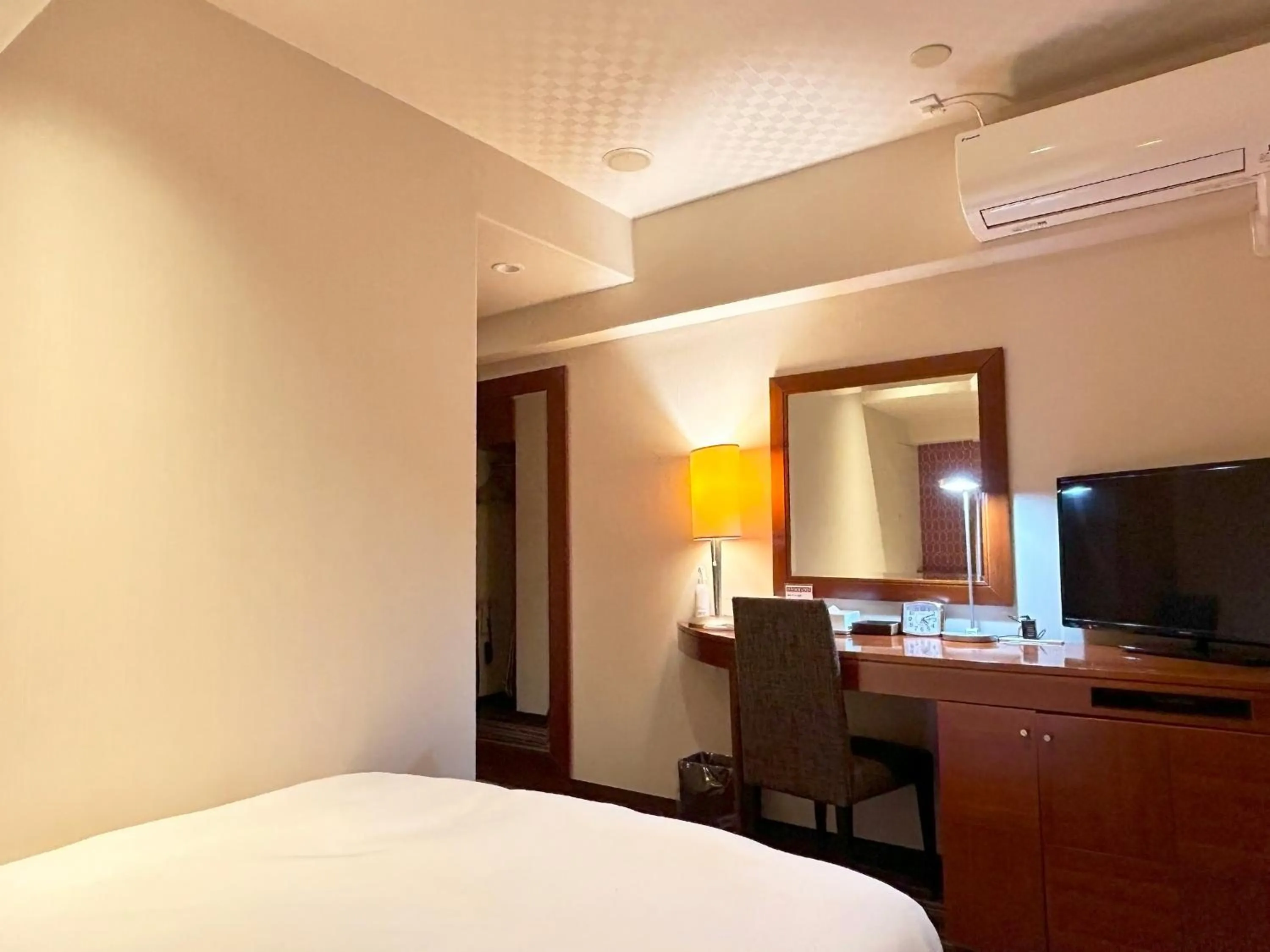 Bed in Nakajimaya Grand Hotel