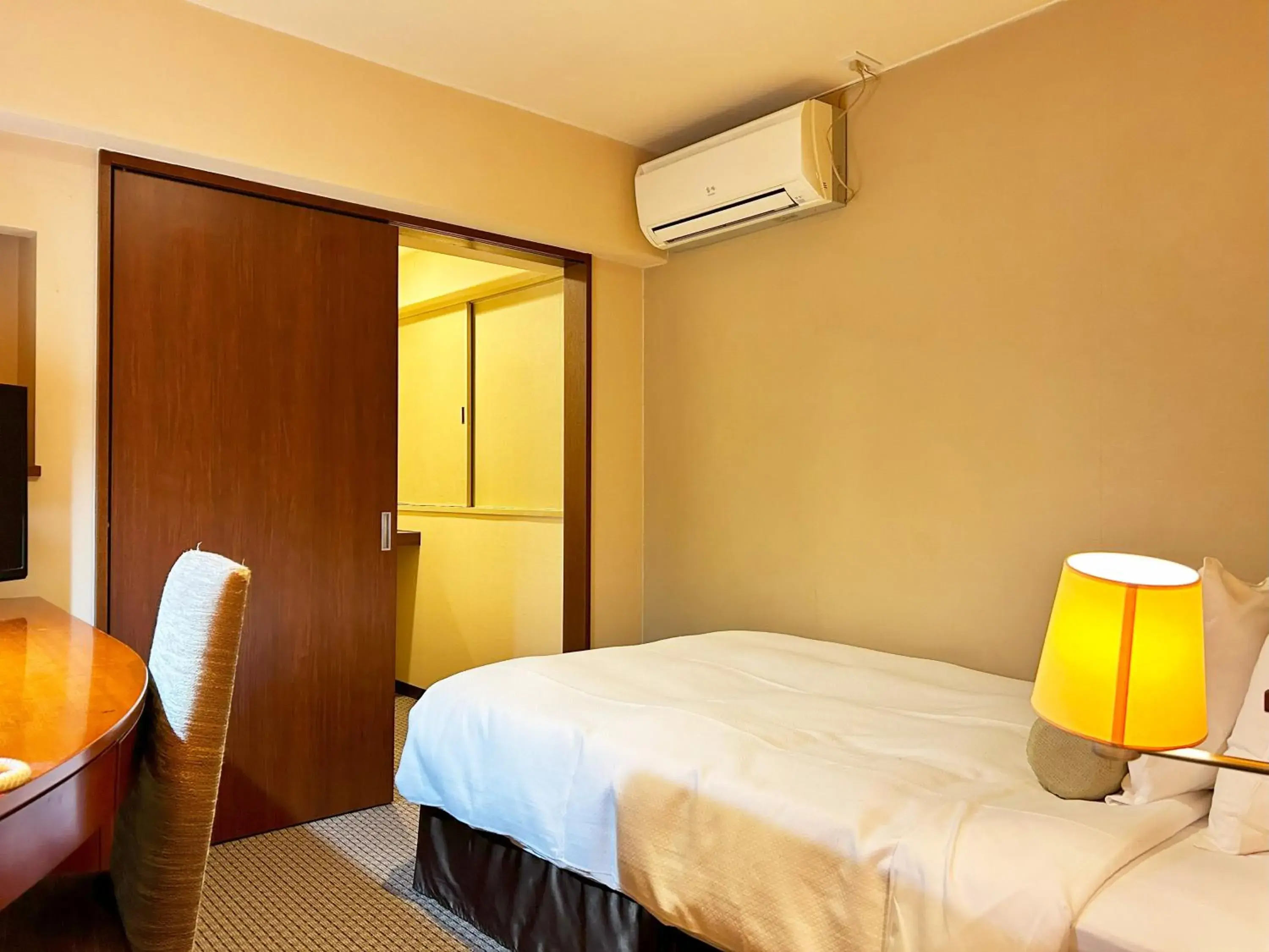 Bed in Nakajimaya Grand Hotel Bed in Nakajimaya Grand Hotel