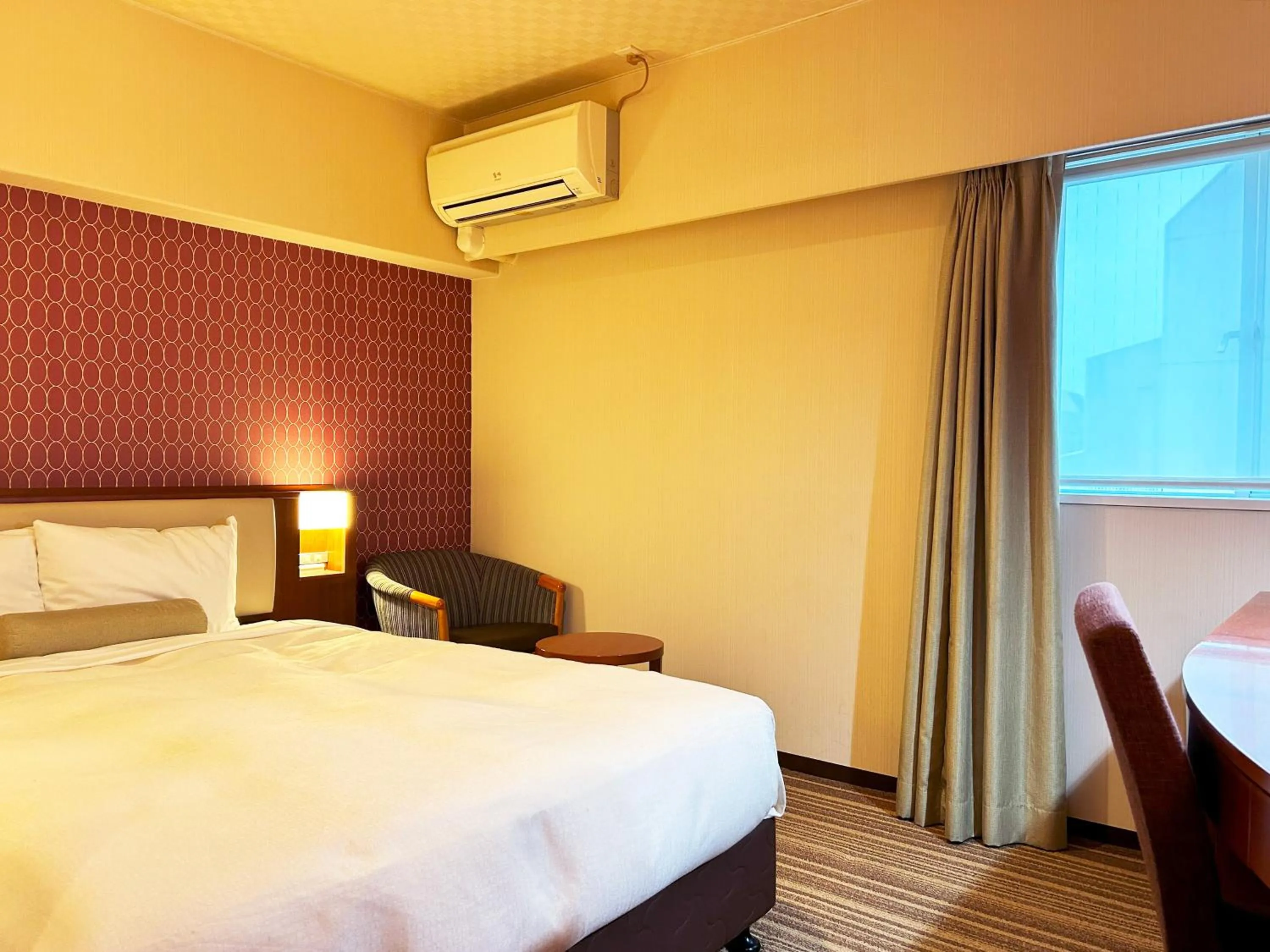 Bed in Nakajimaya Grand Hotel