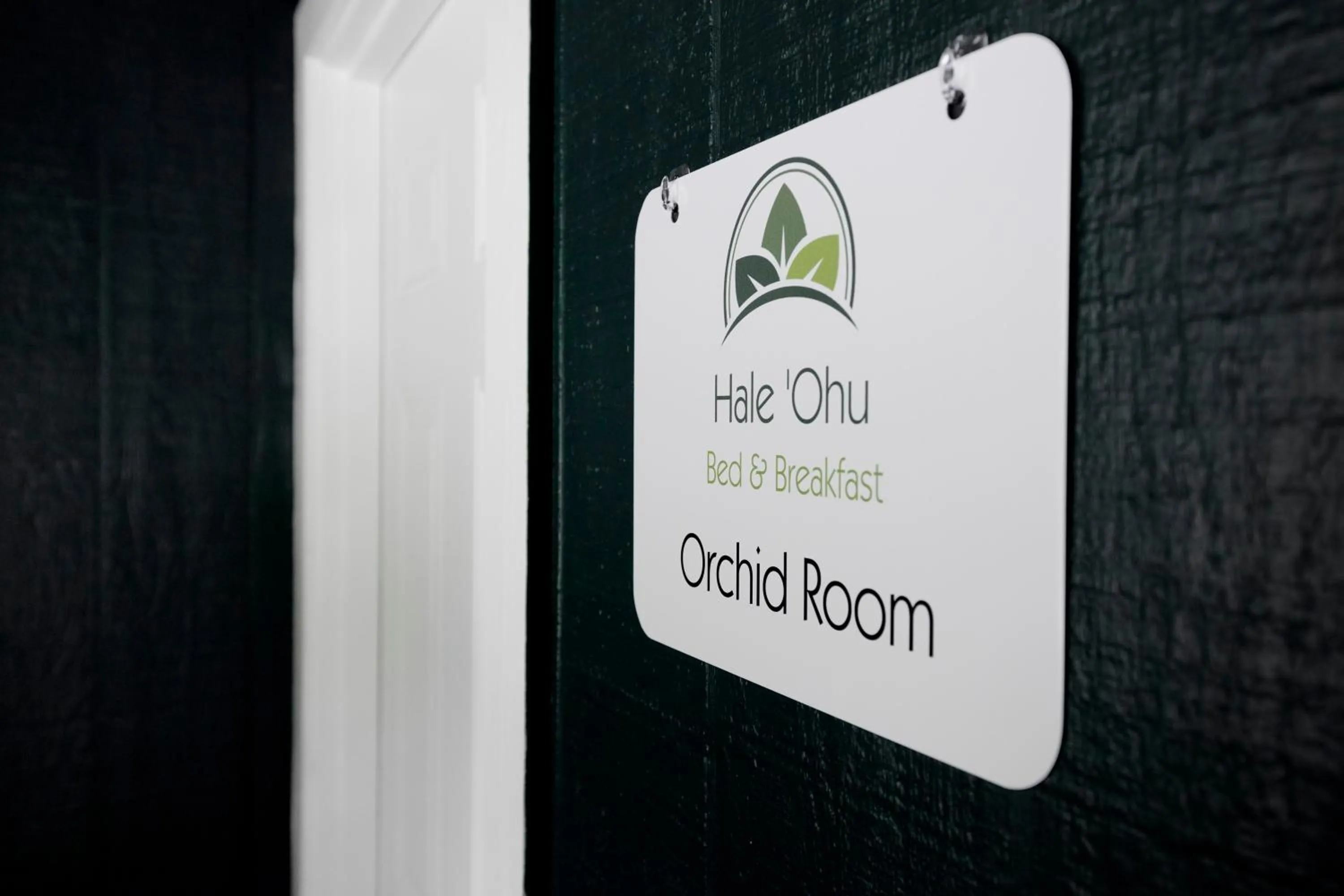 Property logo or sign in Hale 'Ohu Bed & Breakfast