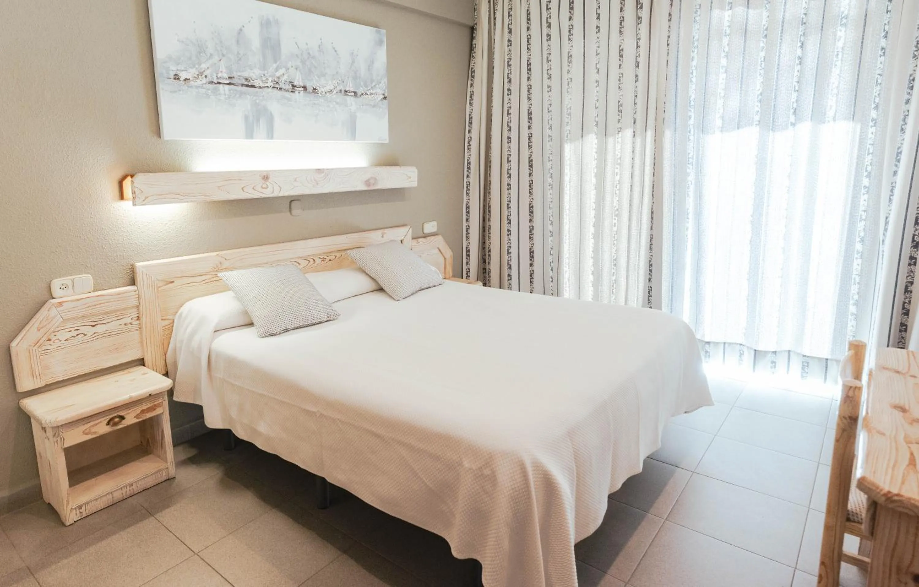 Bed in Hotel S'Agoita