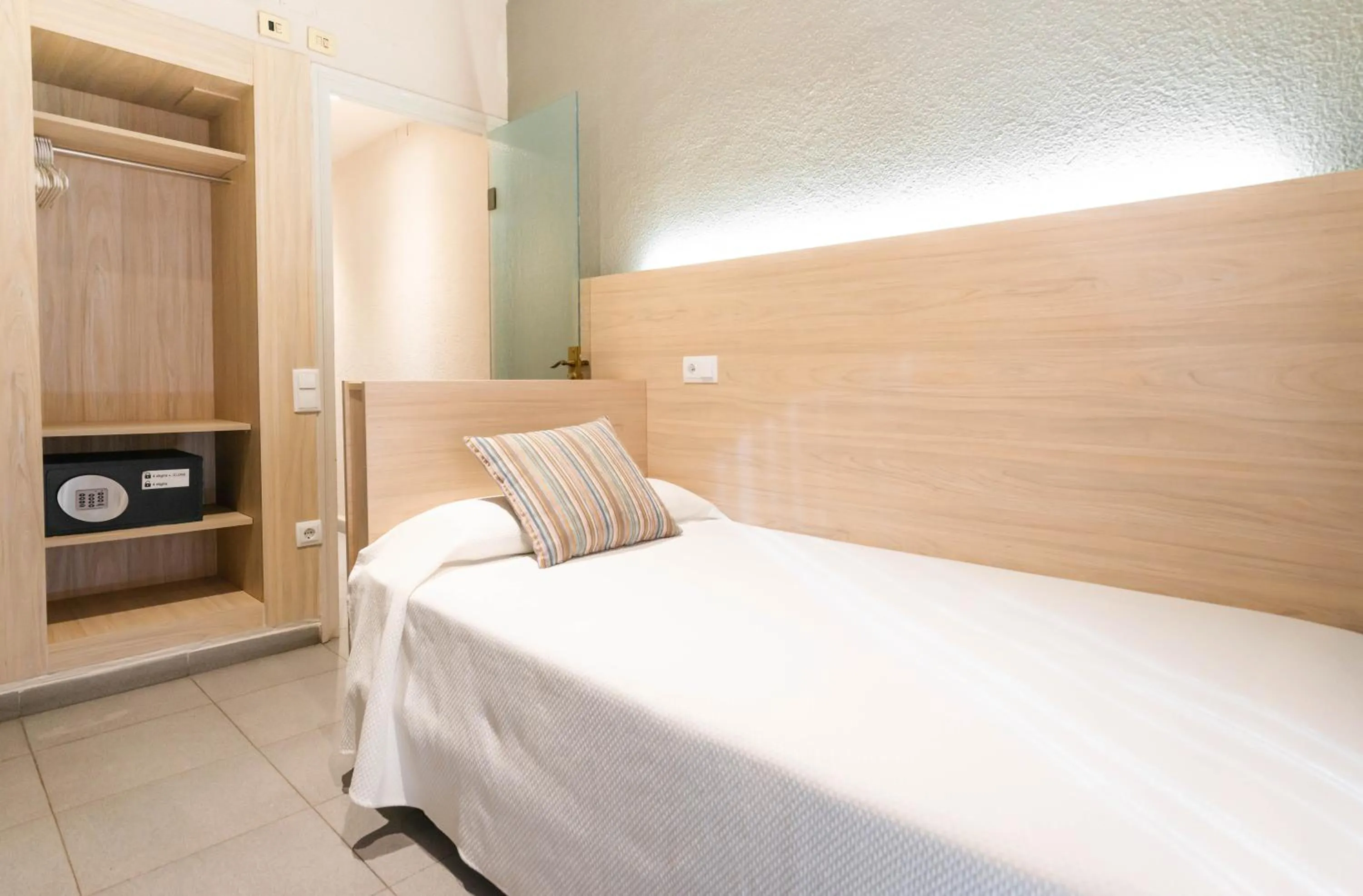 Bed in Hotel S'Agoita