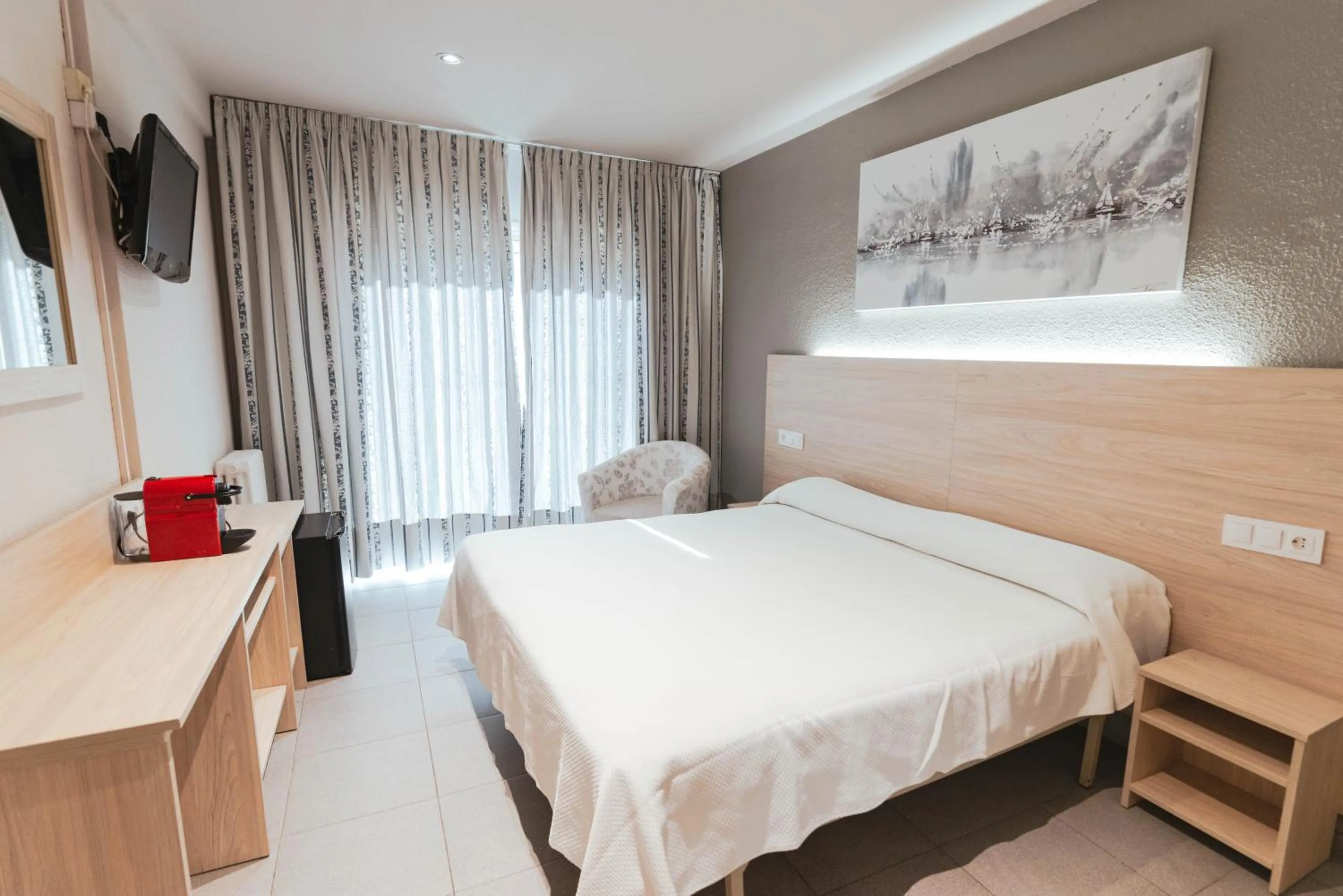 Bed in Hotel S'Agoita