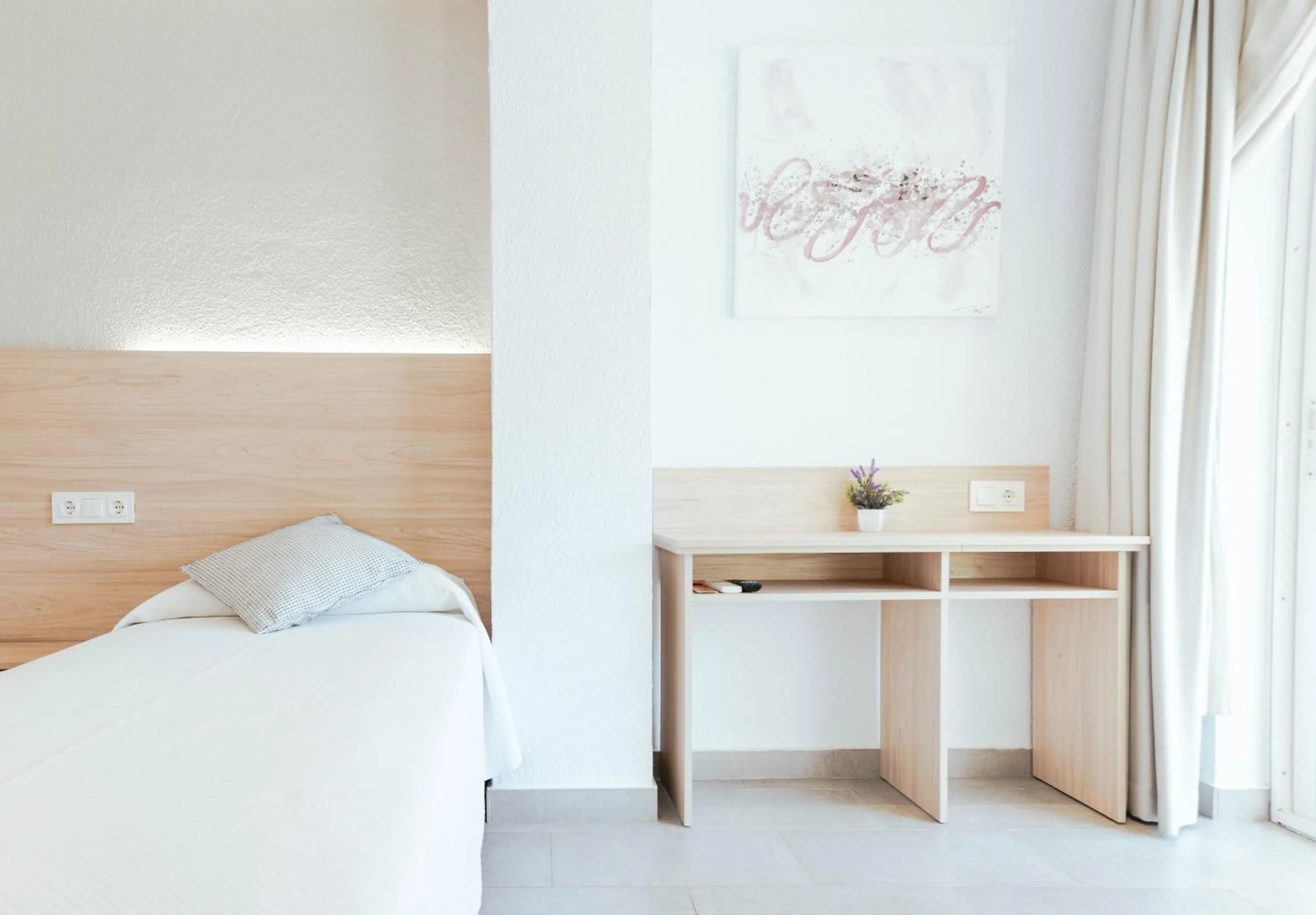 Bed in Hotel S'Agoita