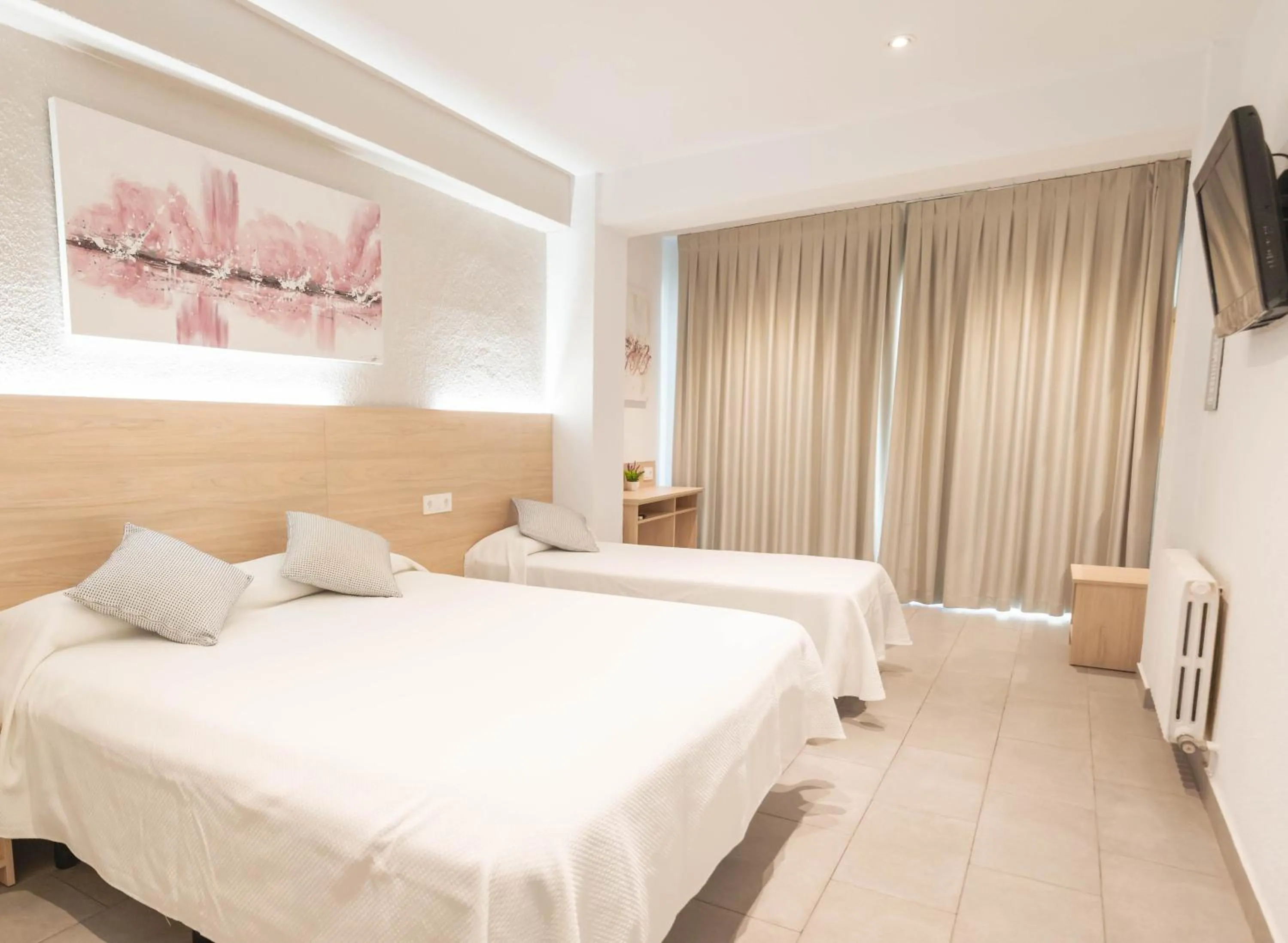 Bed in Hotel S'Agoita