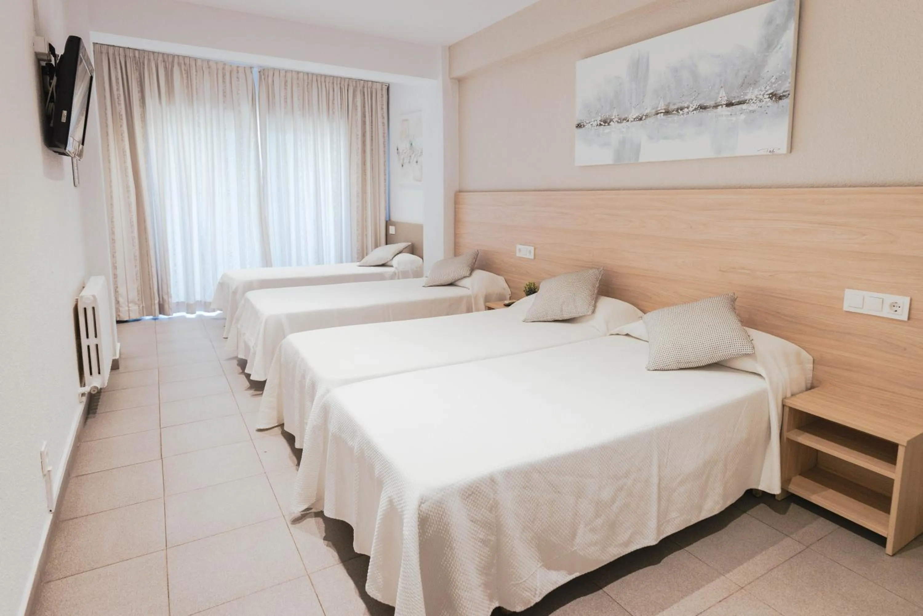 Bed in Hotel S'Agoita