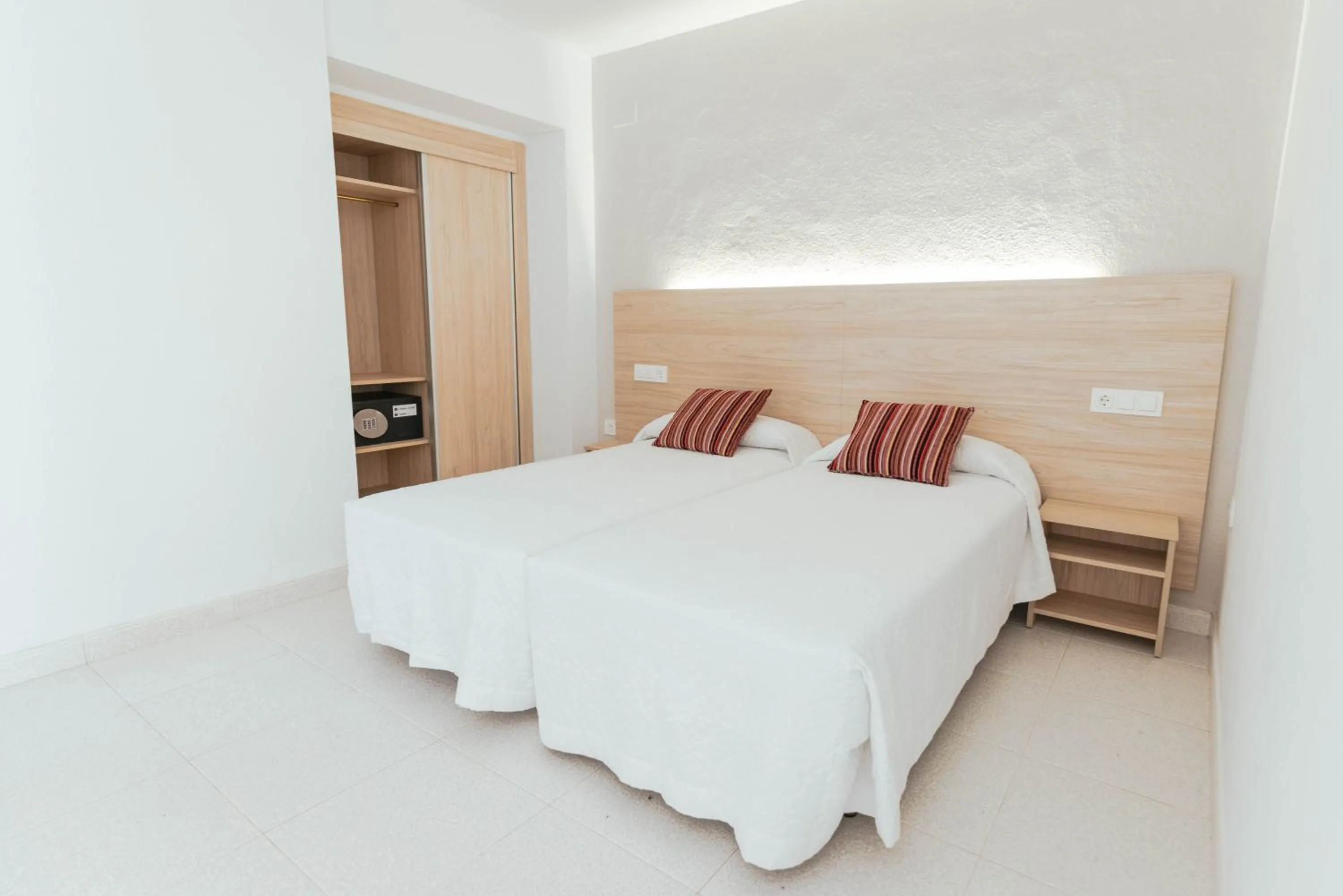 Bed in Hotel S'Agoita