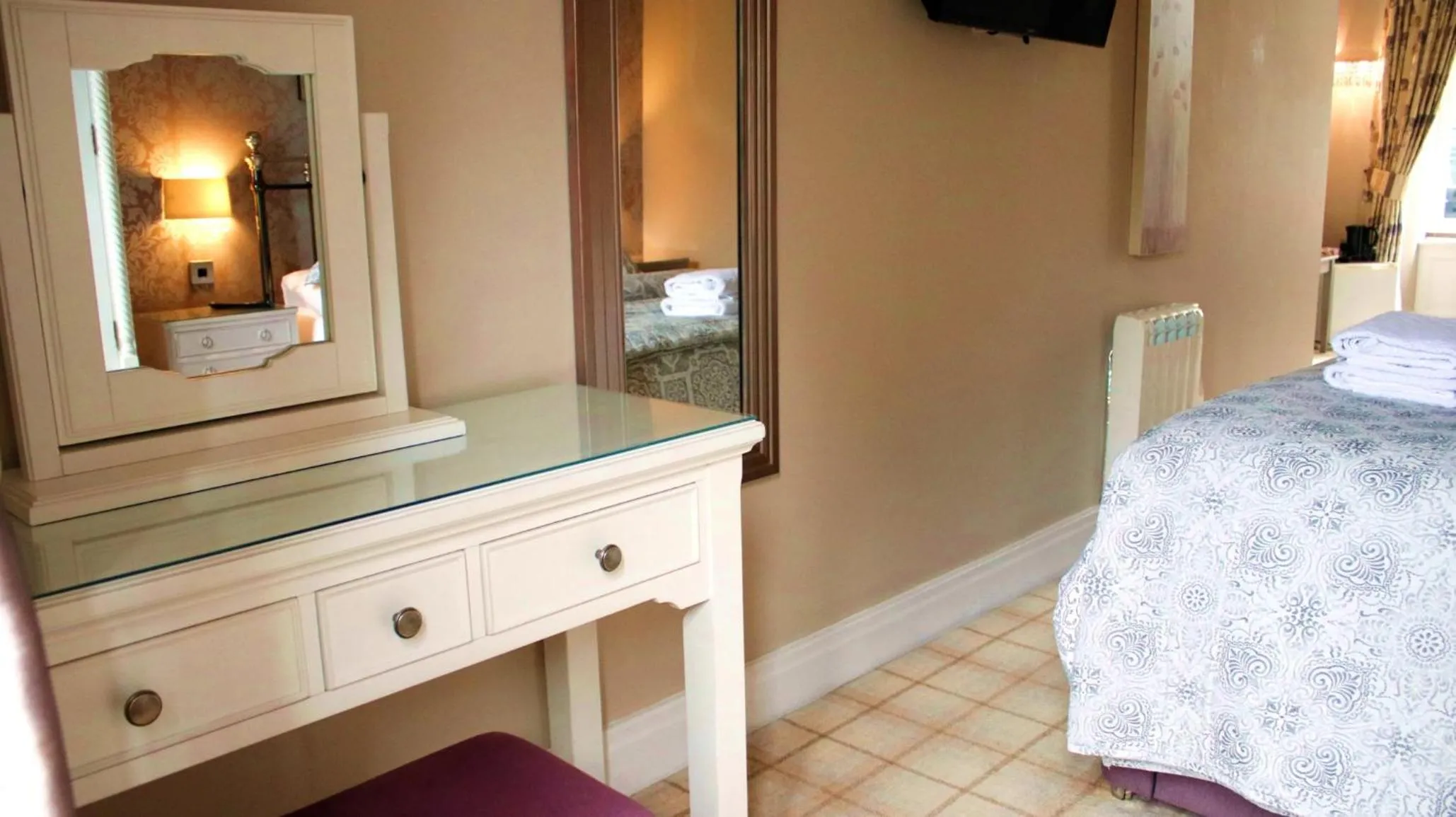 Bed in Bowness Bay Suites