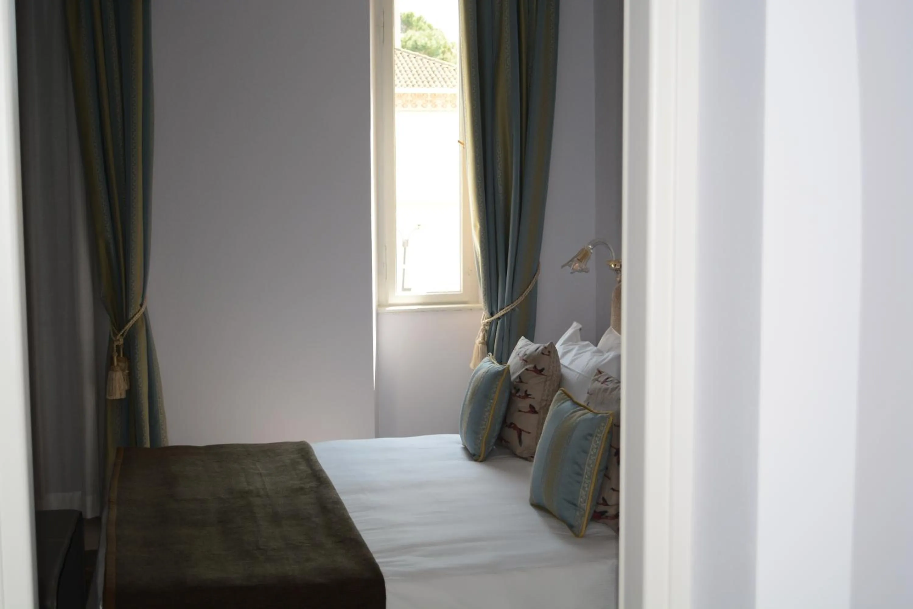 Bed in Les 7 Suites Erica