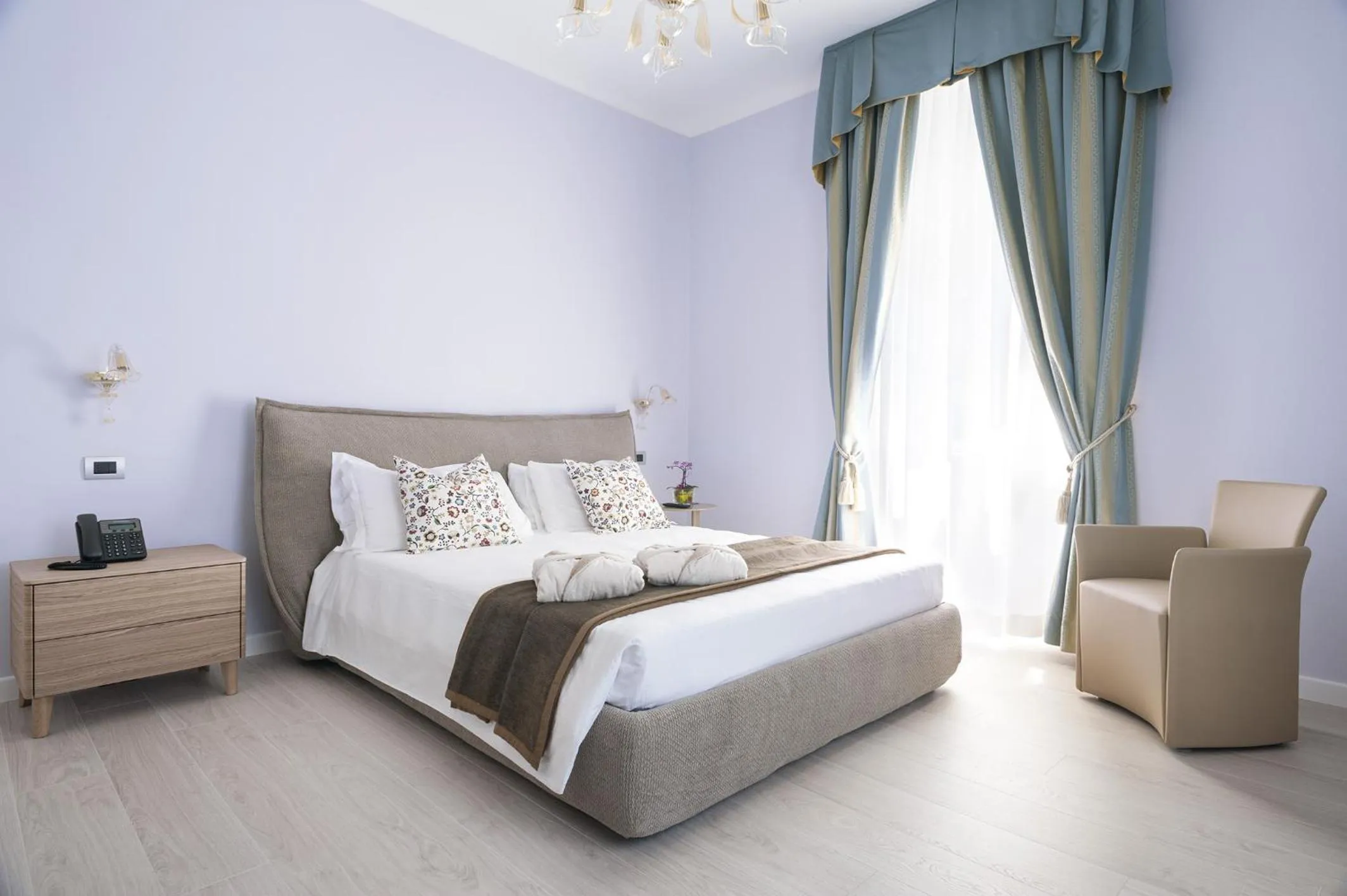 Bed in Les 7 Suites Erica