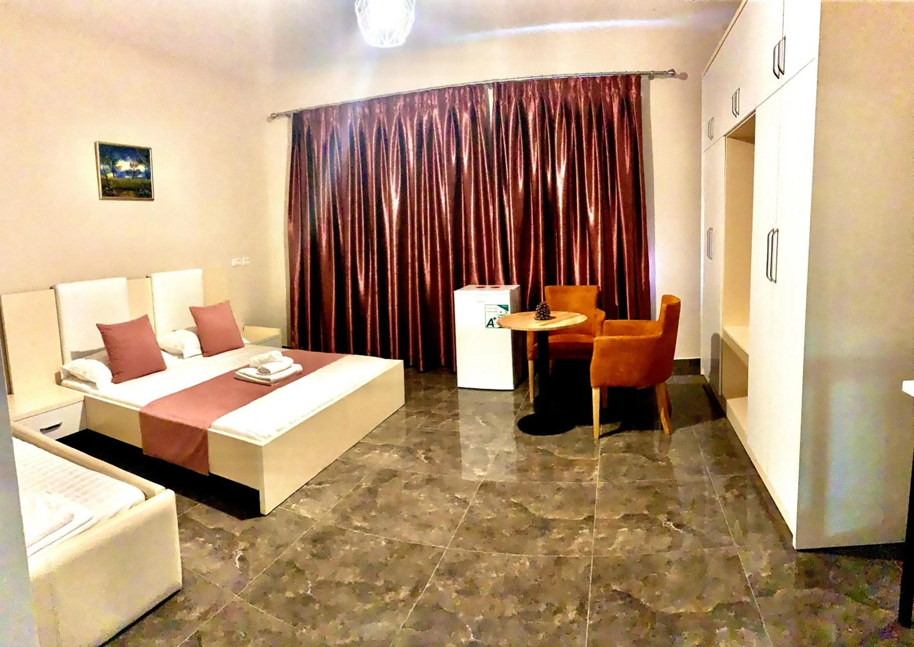 Photo of the whole room, Bed in Diamond Beach Residence Hotel