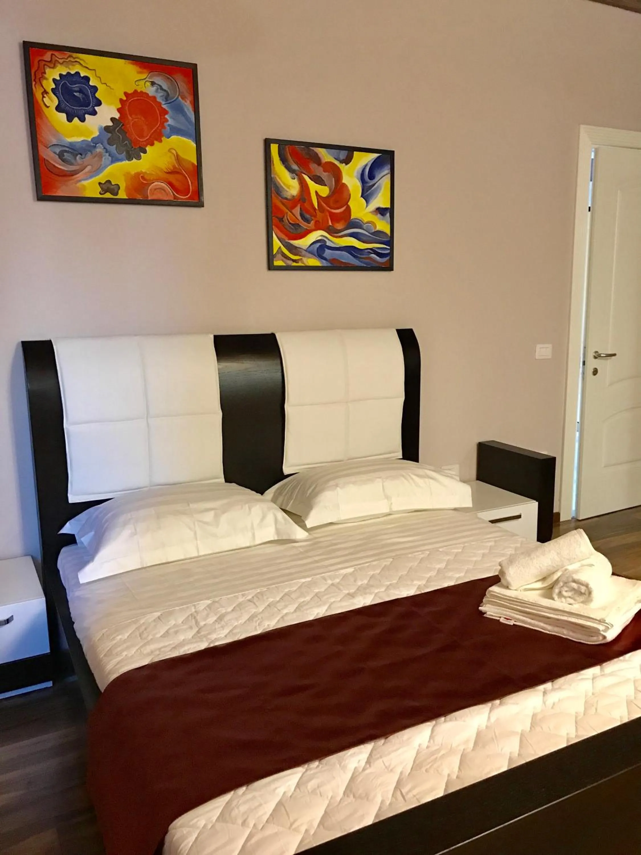 Bed in Diamond Beach Residence Hotel