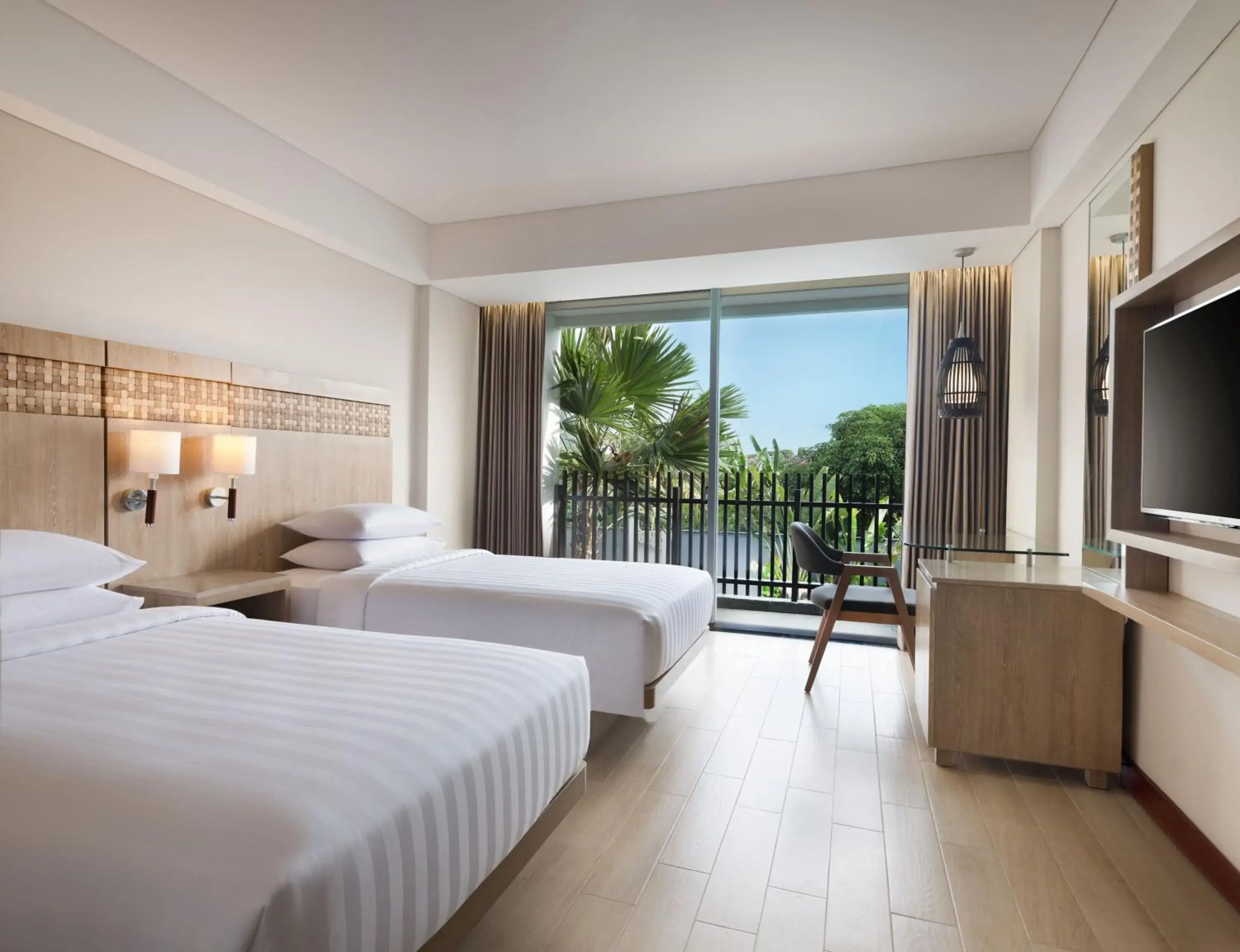 Deluxe Twin Room with Pool View and Free Shuttle Service to Double-Six Beach in Fairfield by Marriott Bali Legian Deluxe Twin Room with Pool View and Free Shuttle Service to Double-Six Beach in Fairfield by Marriott Bali Legian