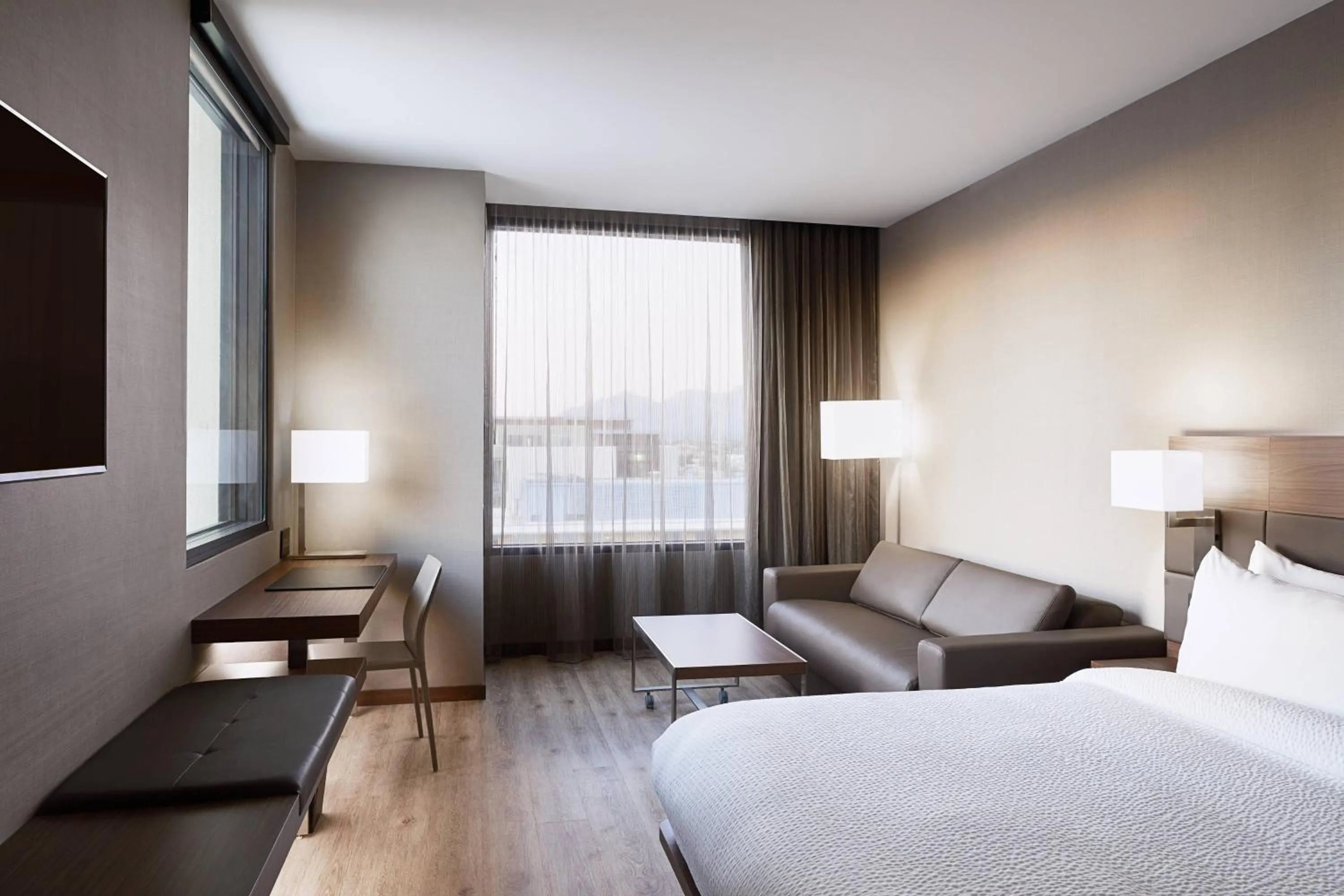 Photo of the whole room, Bed in AC Hotel Tucson Downtown