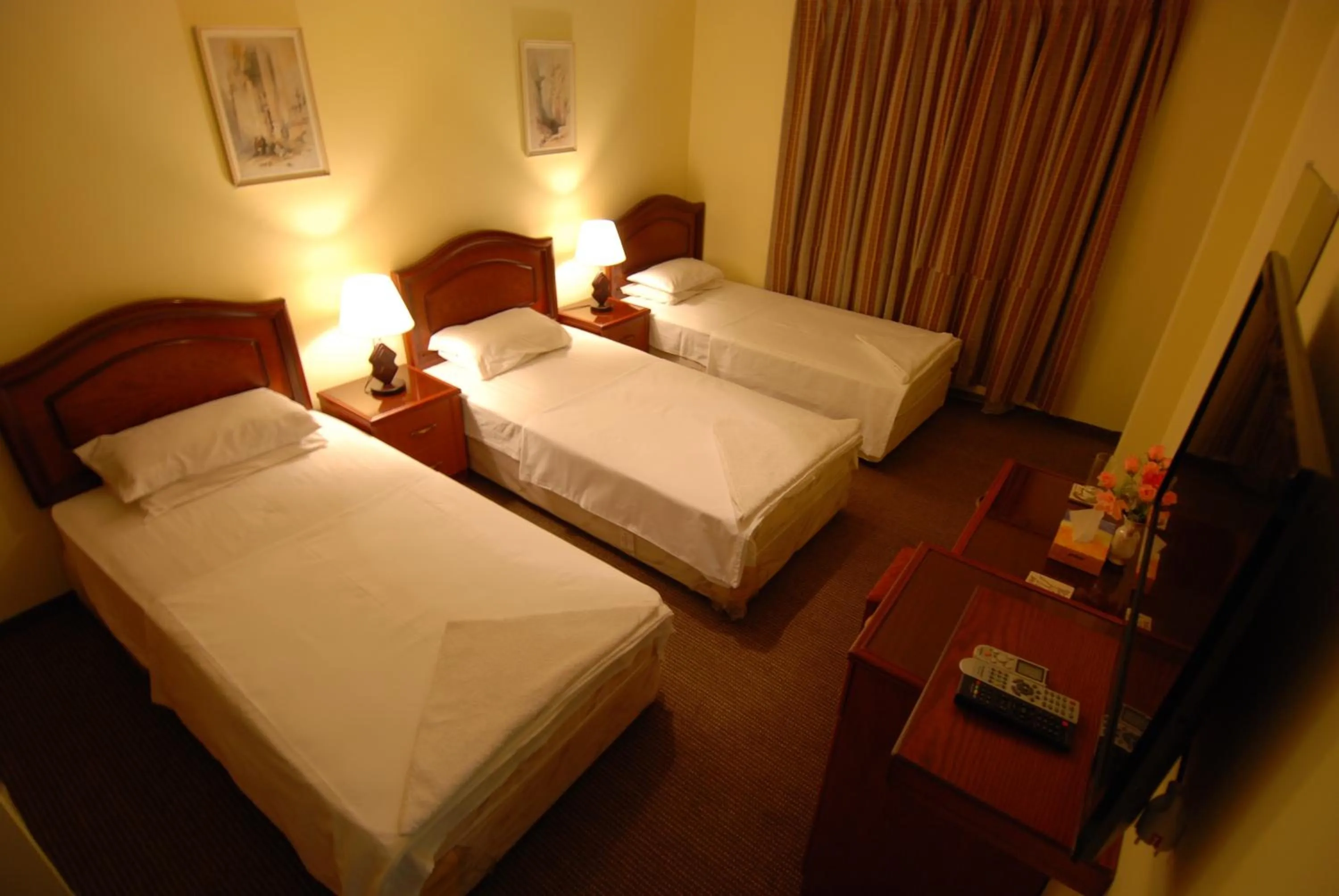 Bed in Al Rashid Hotel