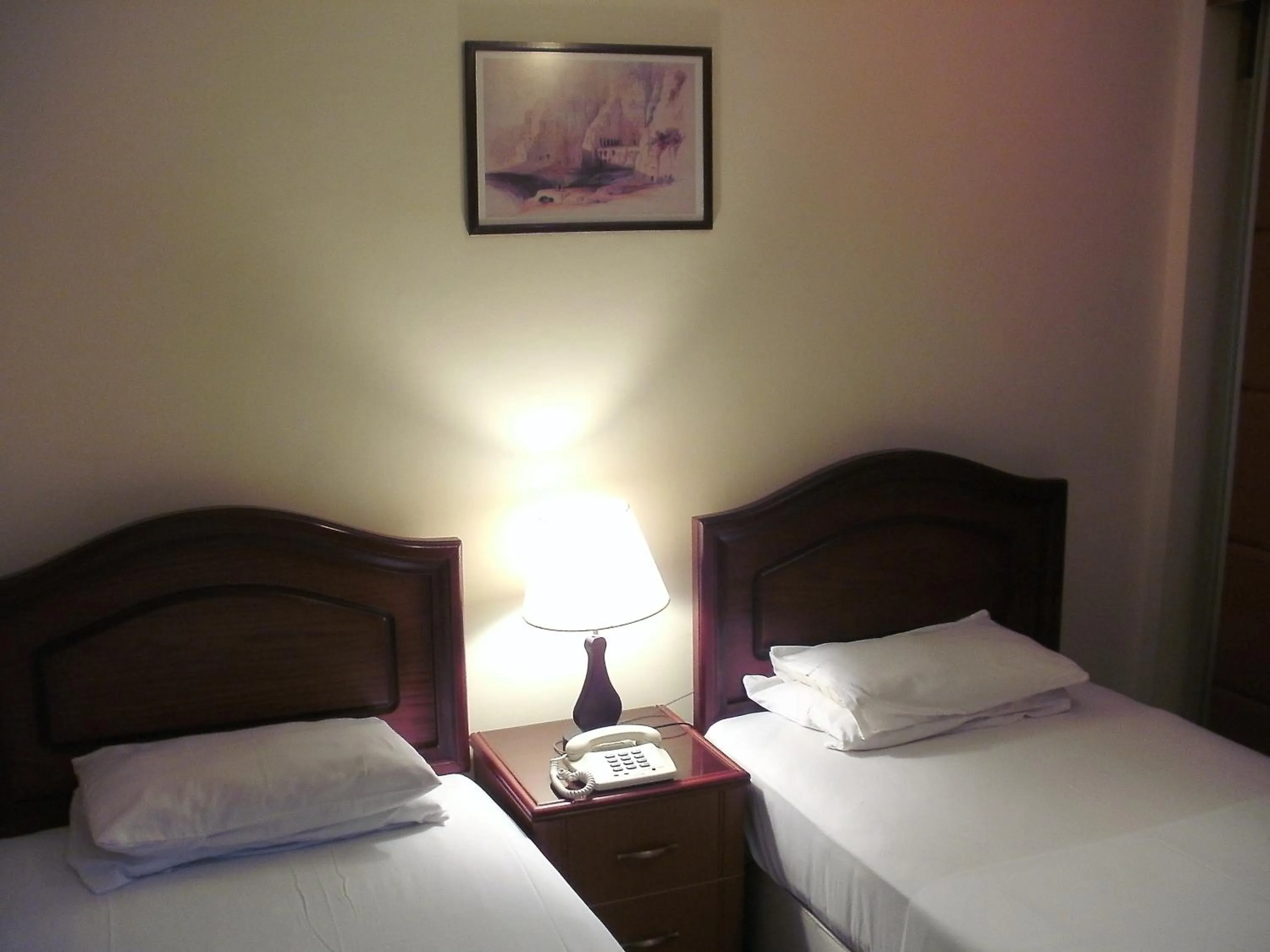 Bed in Al Rashid Hotel