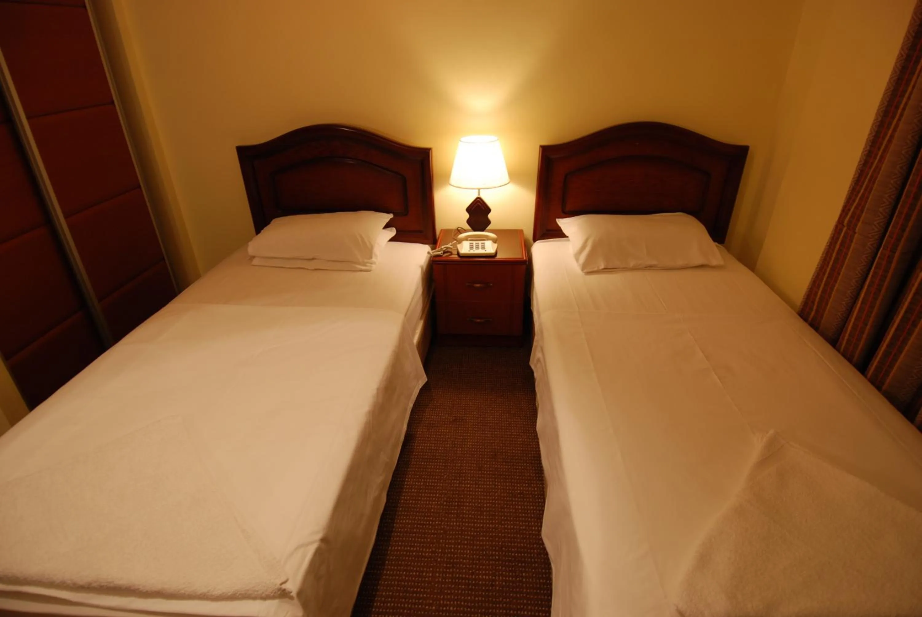 Bed in Al Rashid Hotel