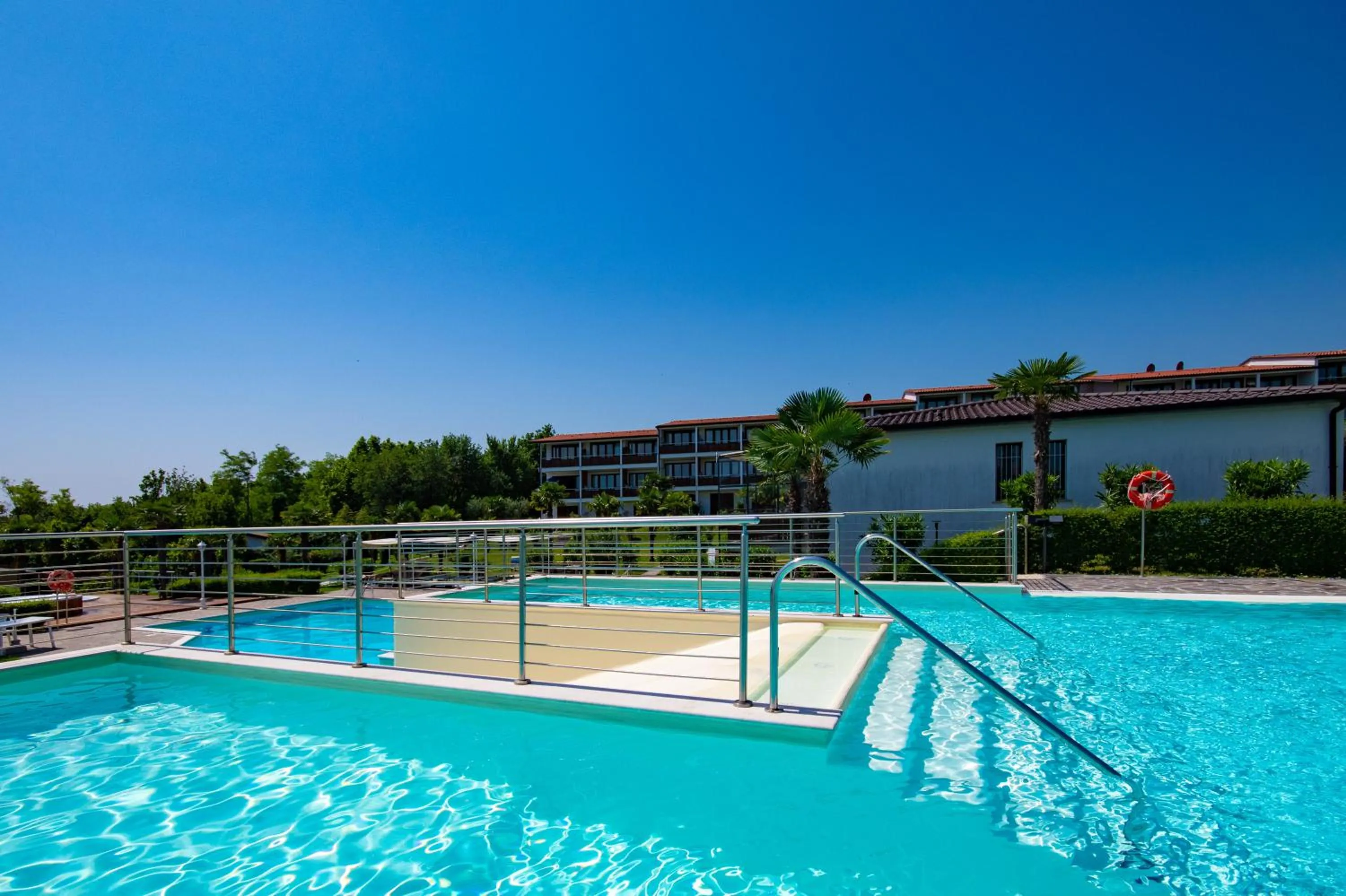 Pool view in Apparthotel San Sivino