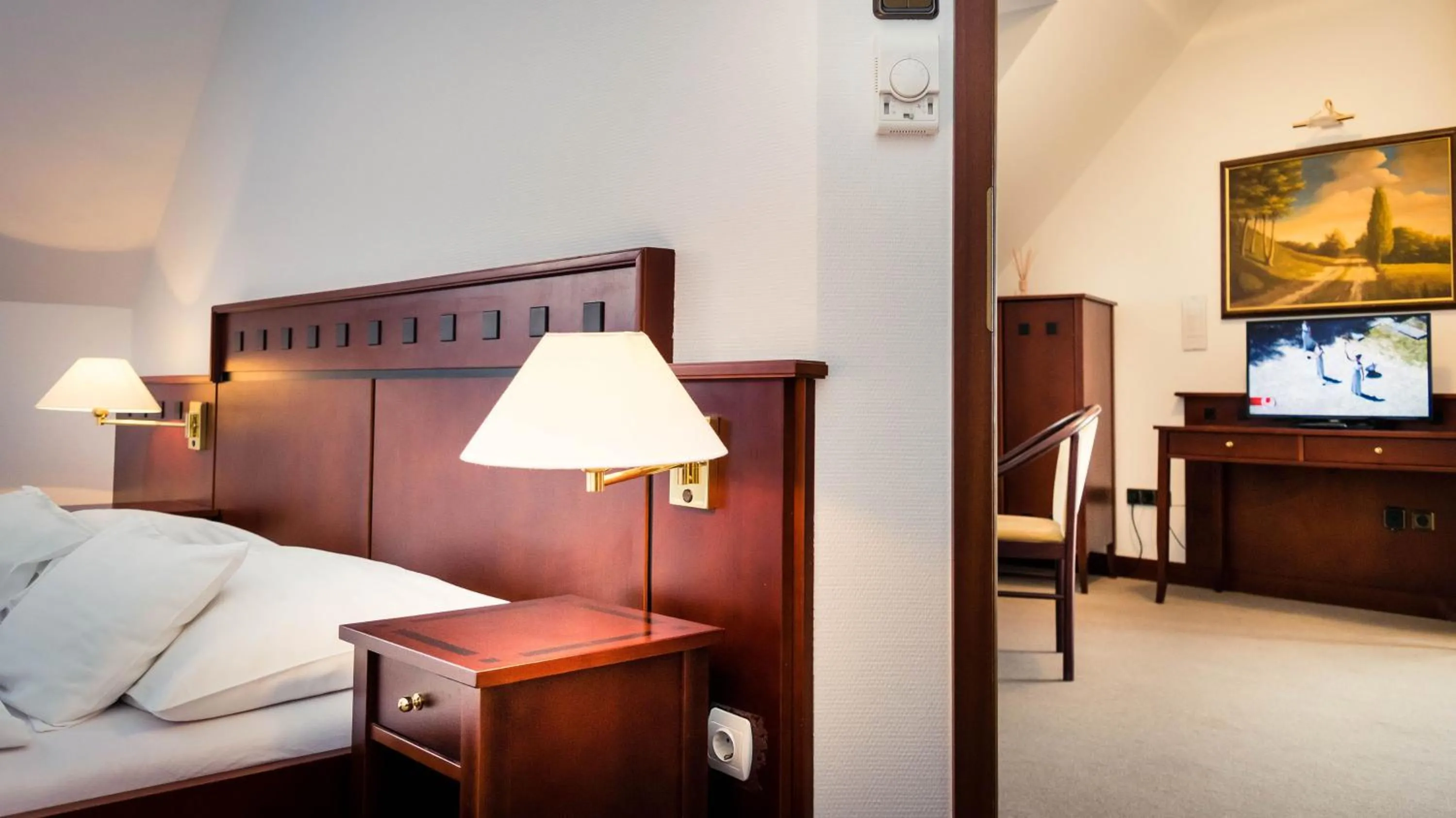 Bed in Hotel Tihany Átrium